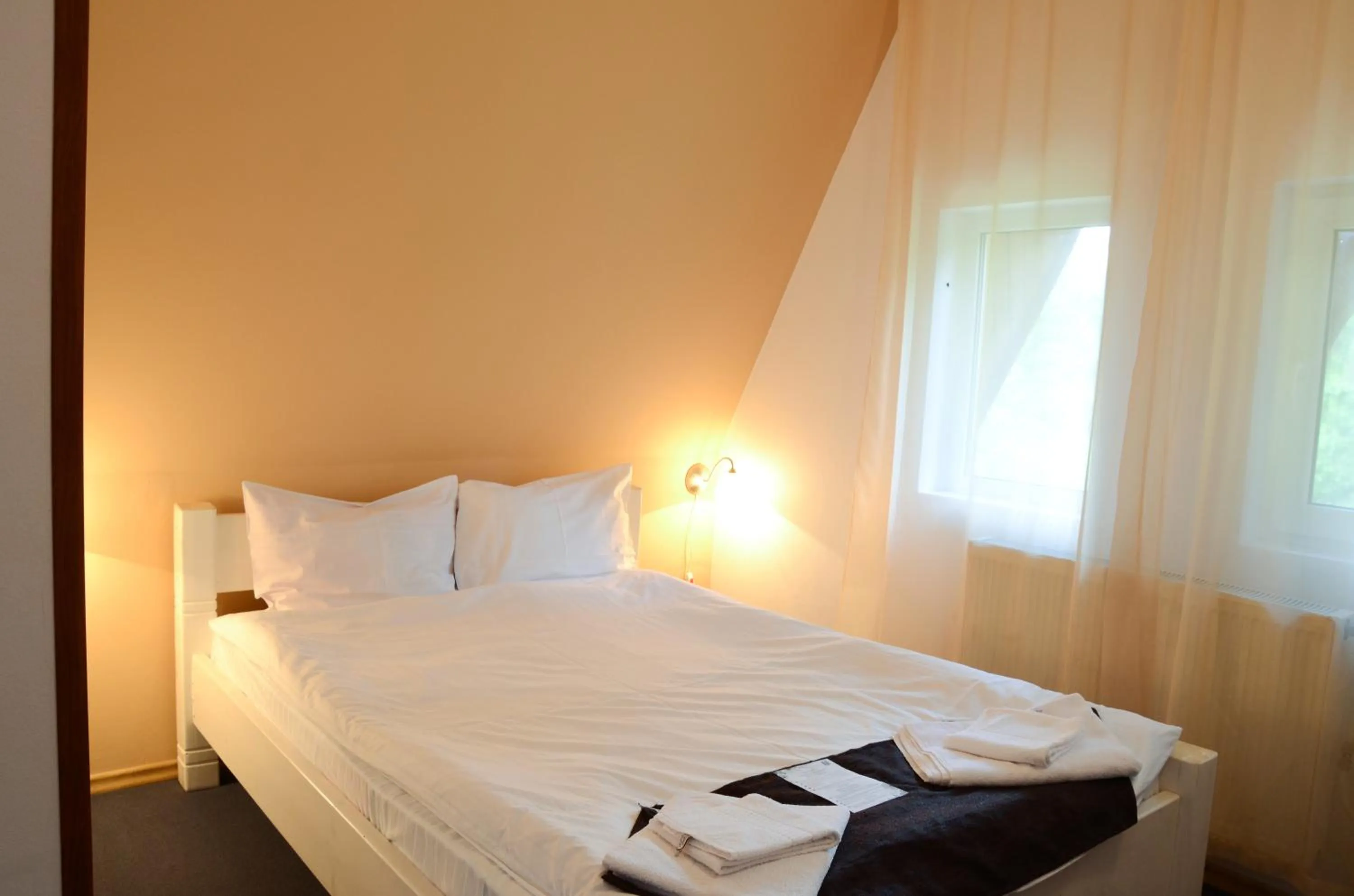 Bed in Pensiunea Happy Inn