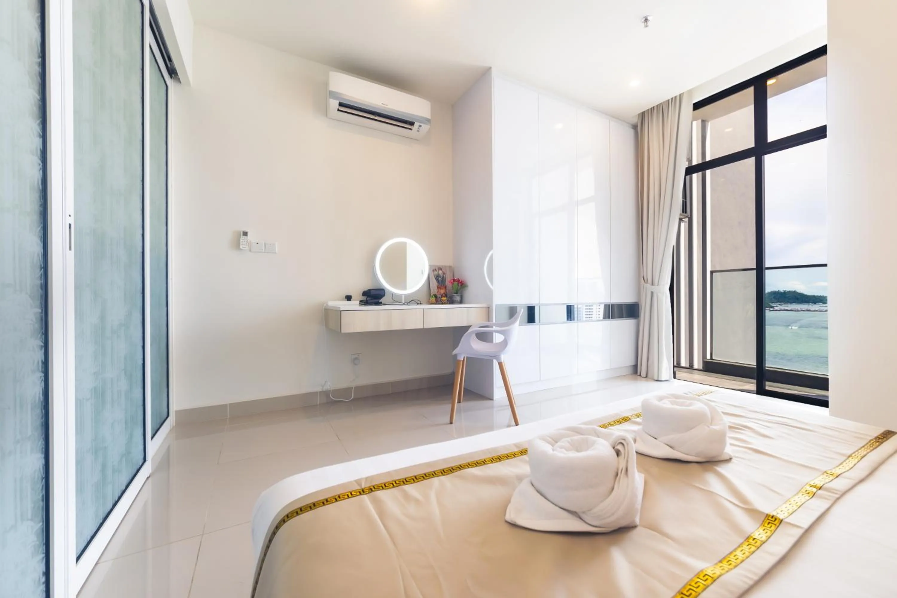 Bed in 5StarPanda Seaview Suites at The Shore Kota Kinabalu