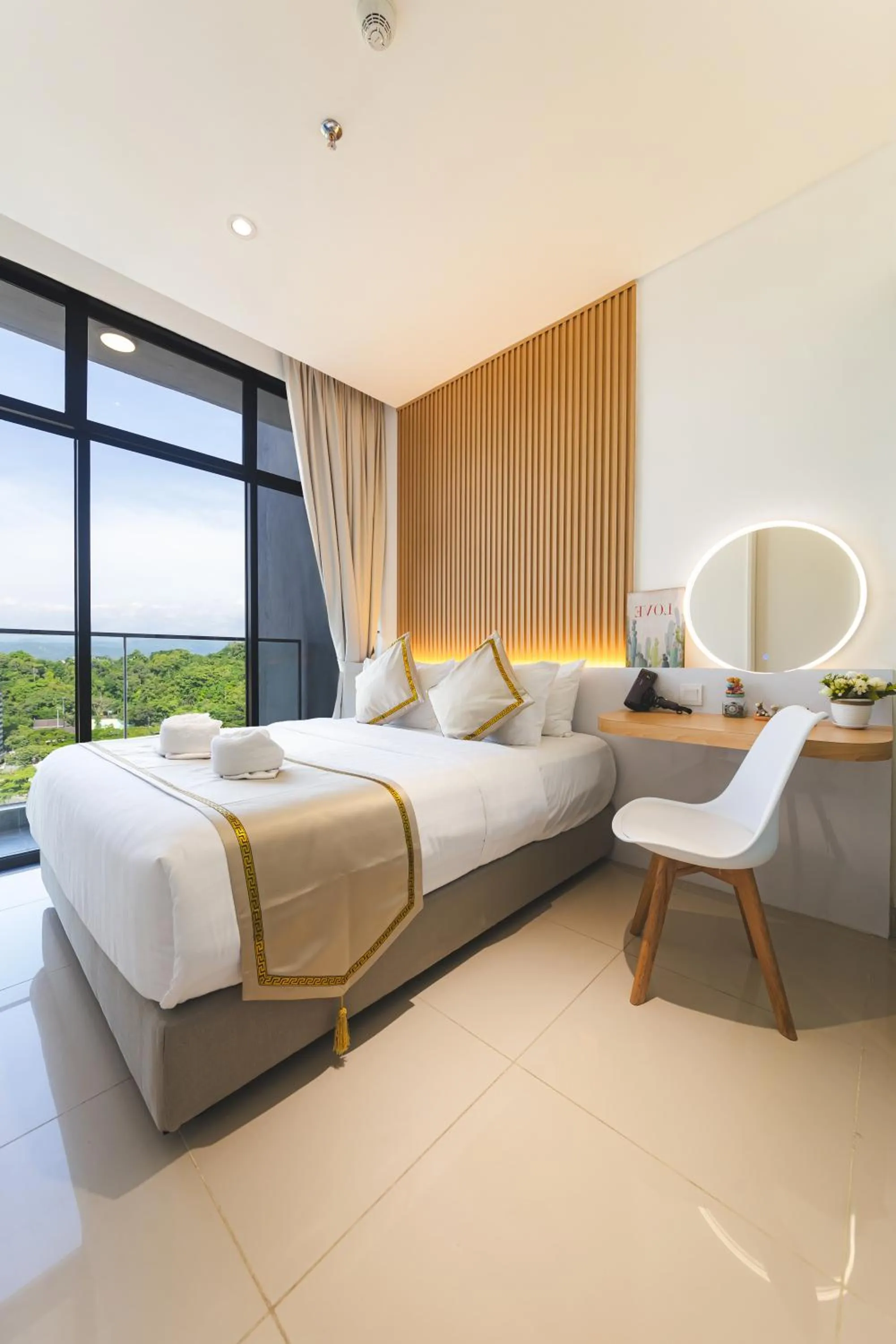 Bed in 5StarPanda Seaview Suites at The Shore Kota Kinabalu