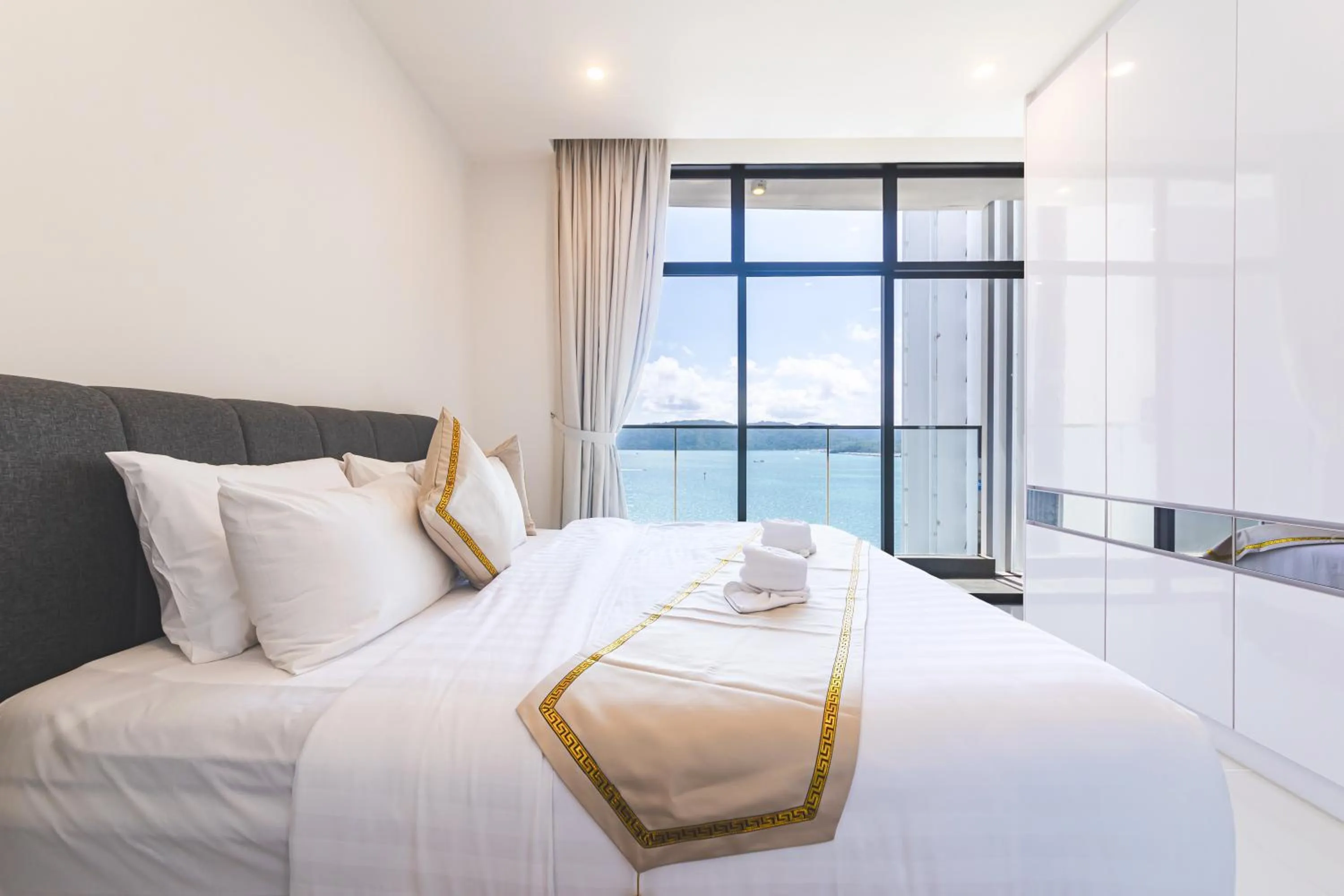 Bed in 5StarPanda Seaview Suites at The Shore Kota Kinabalu
