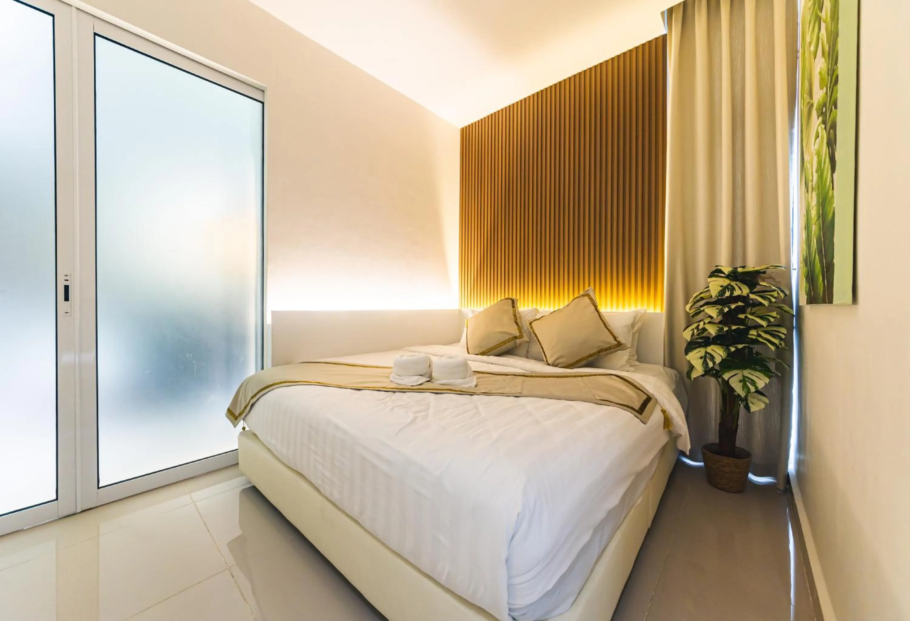 Bed in 5StarPanda Seaview Suites at The Shore Kota Kinabalu