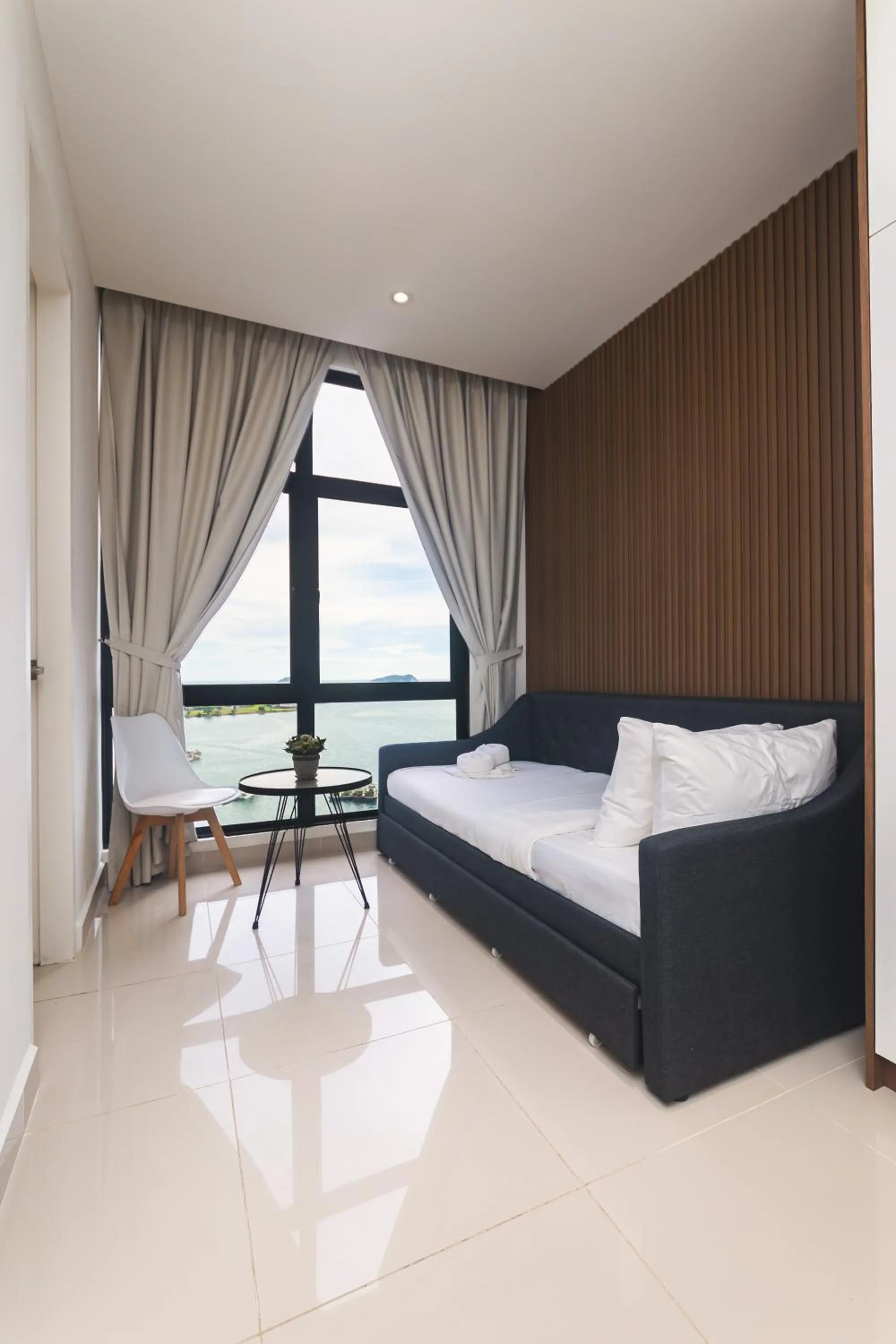 Bed in 5StarPanda Seaview Suites at The Shore Kota Kinabalu