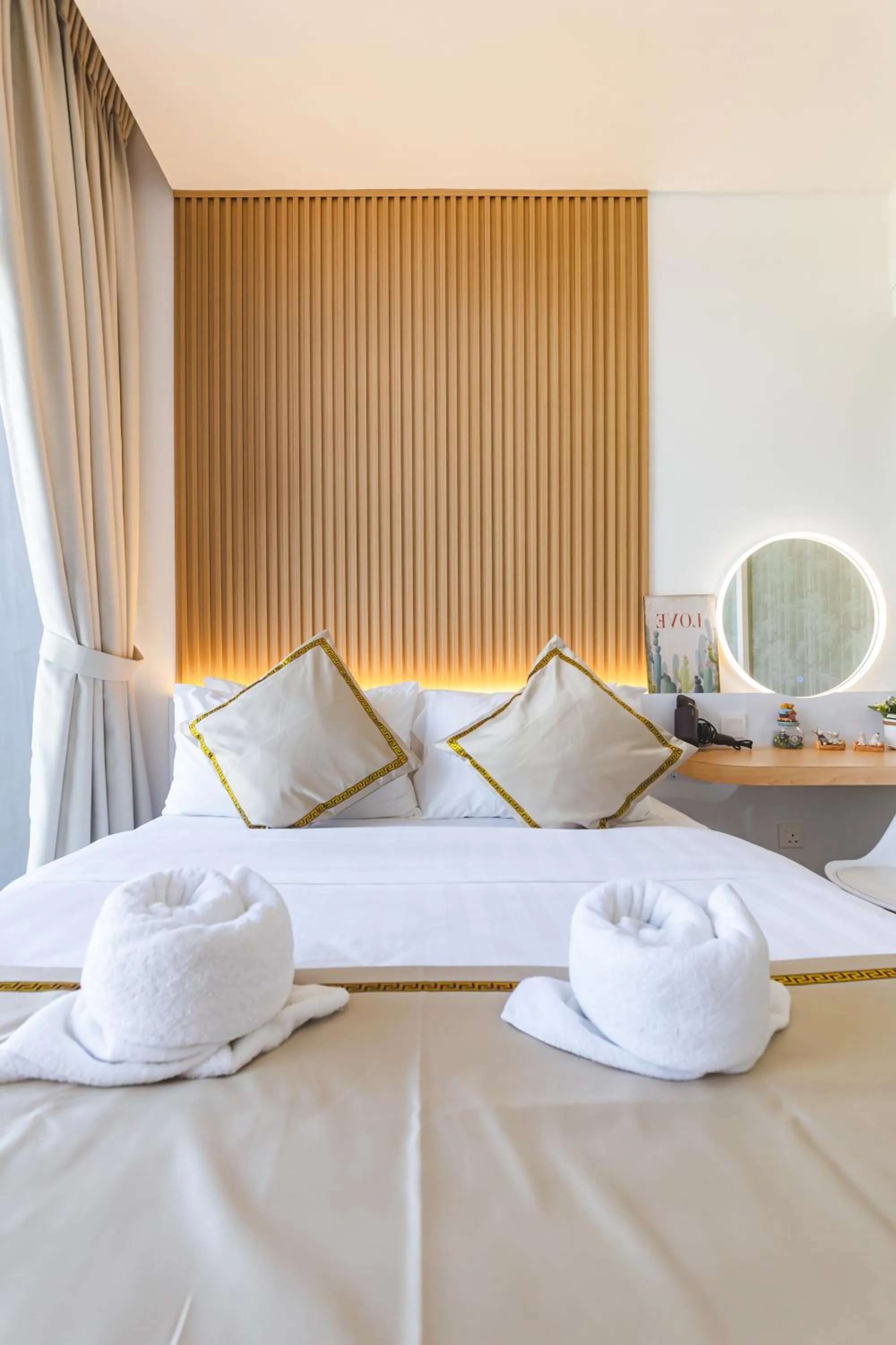 Bed in 5StarPanda Seaview Suites at The Shore Kota Kinabalu