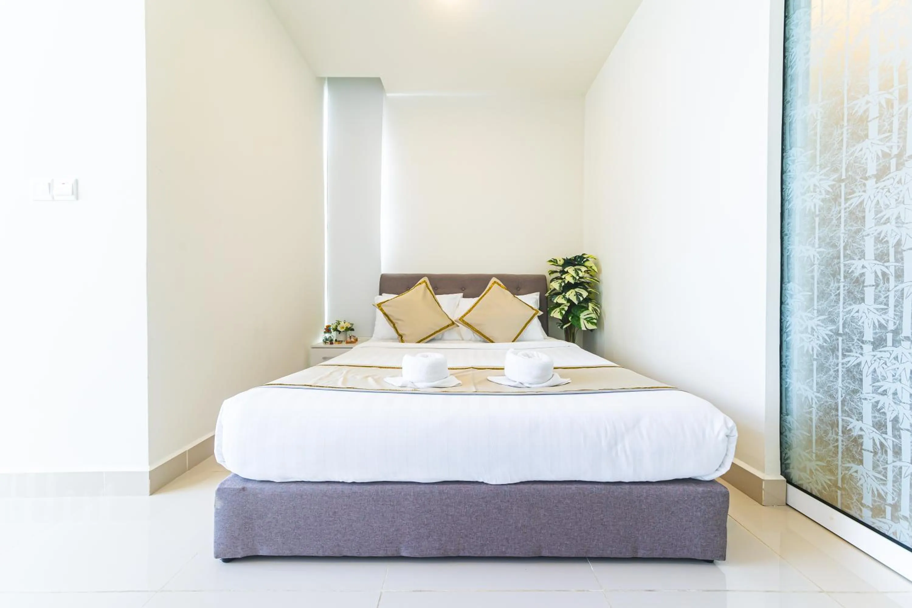 Bed in 5StarPanda Seaview Suites at The Shore Kota Kinabalu