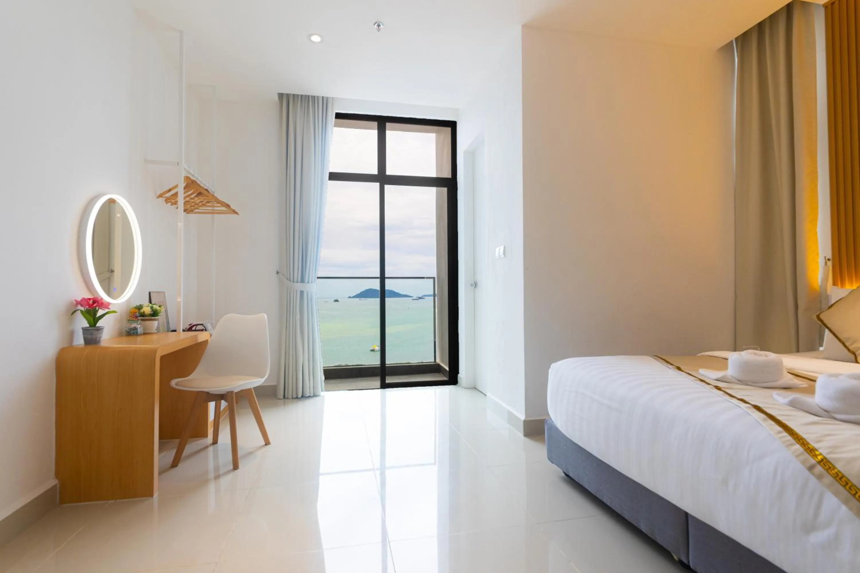 Bed in 5StarPanda Seaview Suites at The Shore Kota Kinabalu