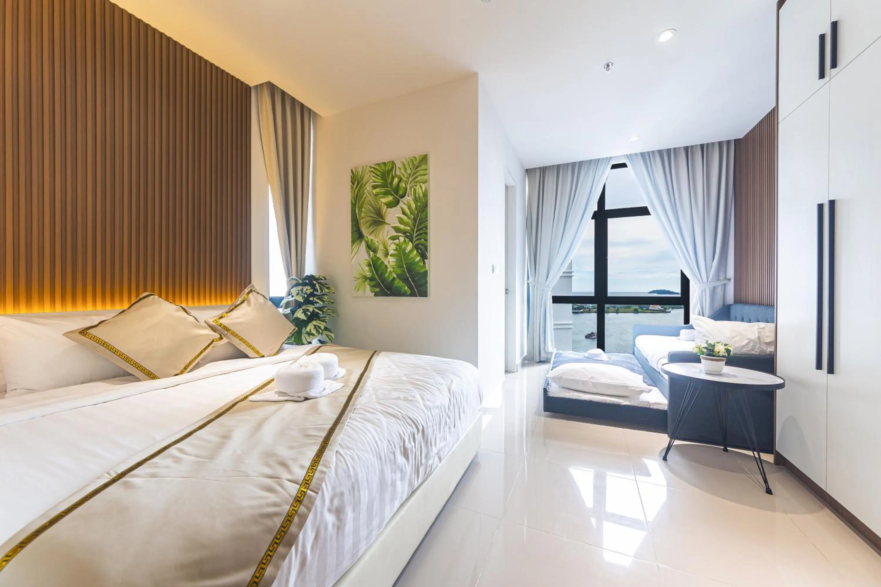Bed in 5StarPanda Seaview Suites at The Shore Kota Kinabalu