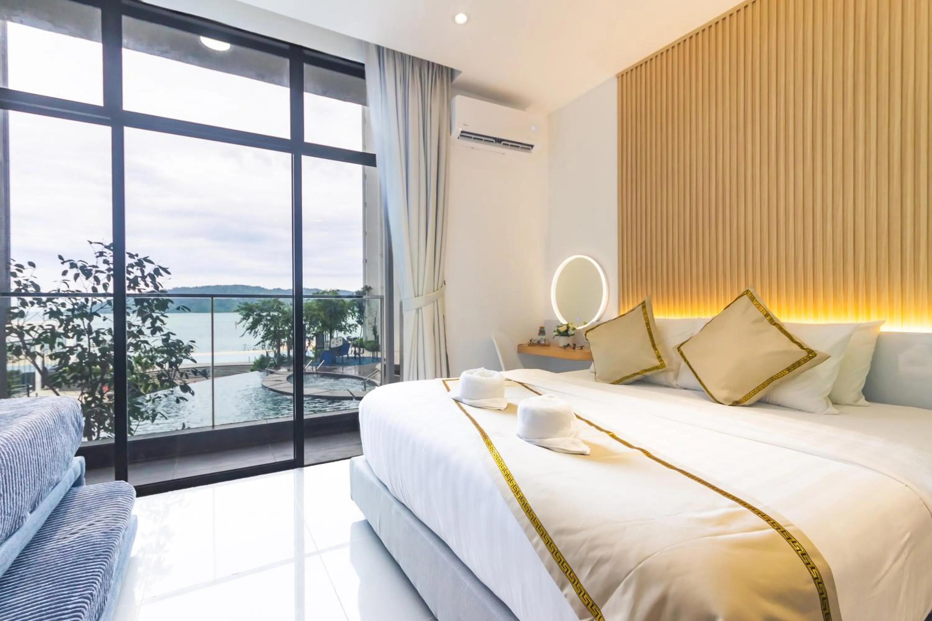 Bed in 5StarPanda Seaview Suites at The Shore Kota Kinabalu
