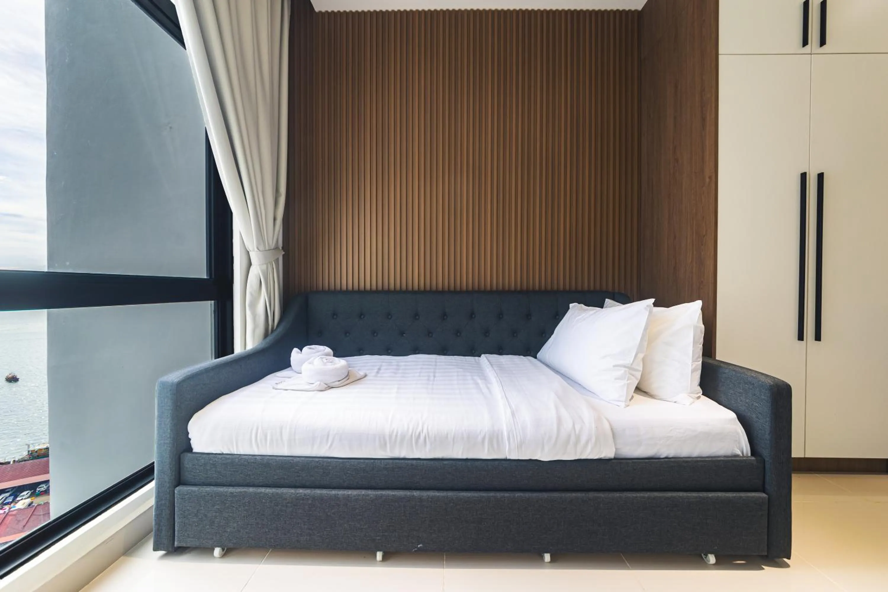 Bed in 5StarPanda Seaview Suites at The Shore Kota Kinabalu