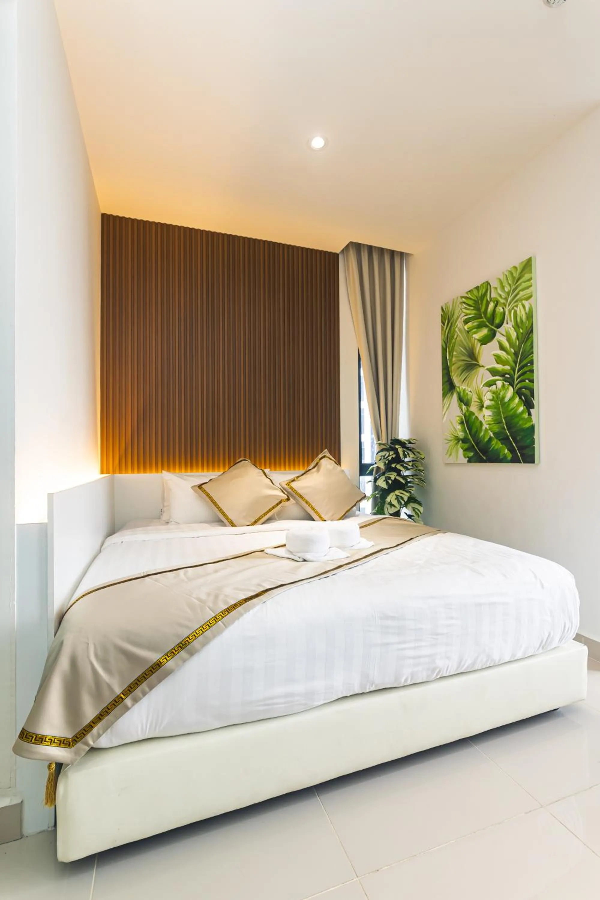 Bed in 5StarPanda Seaview Suites at The Shore Kota Kinabalu