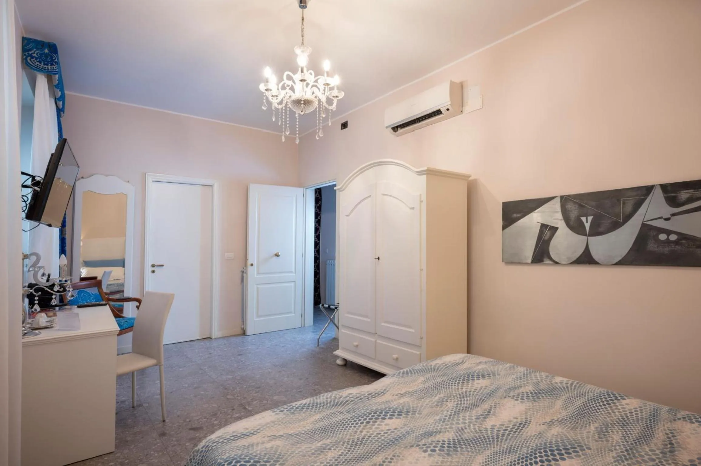 Bed in Porta Di Mezzo Luxury Suites & Rooms