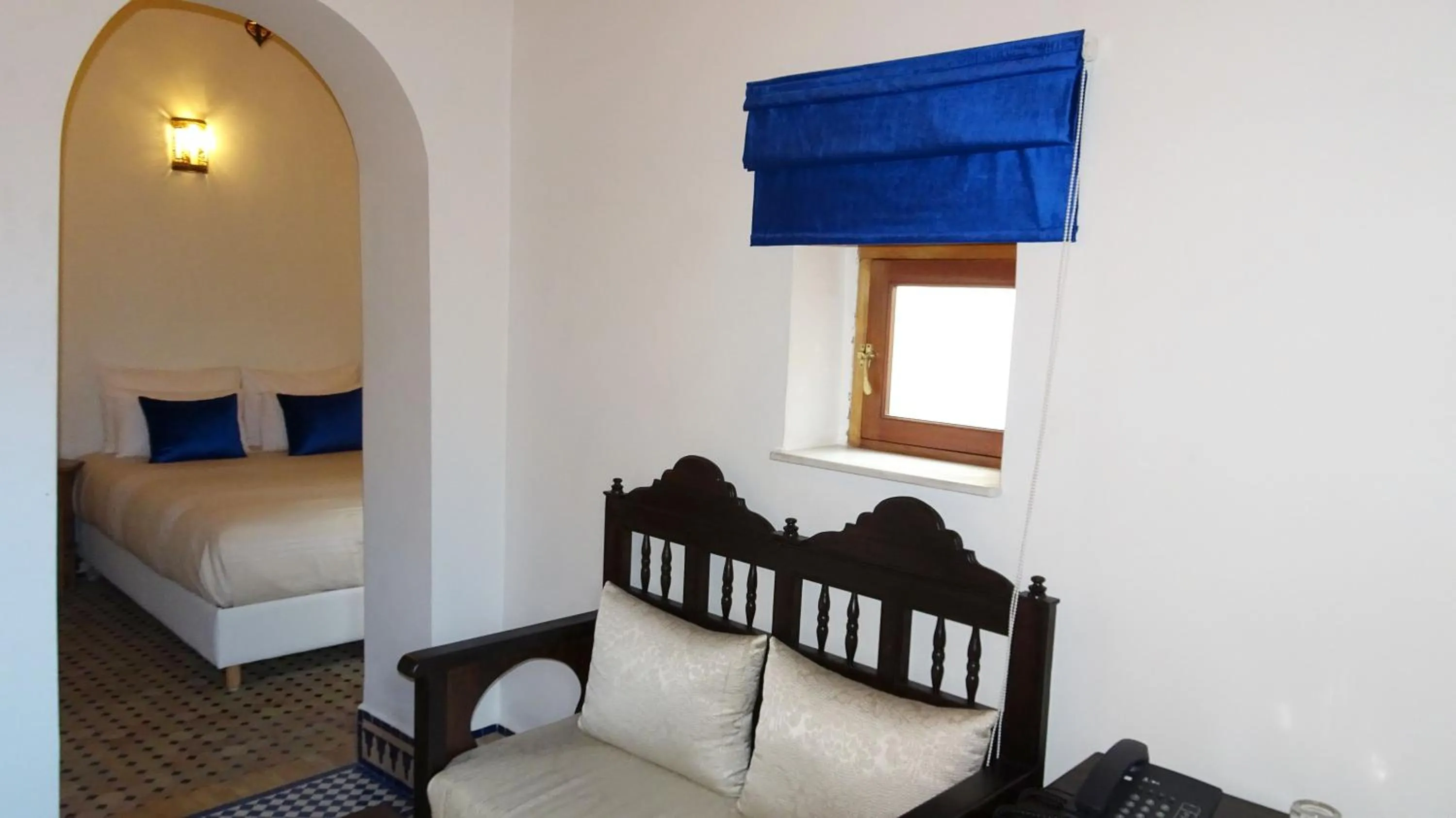 Seating area, Bed in Riad Sabah