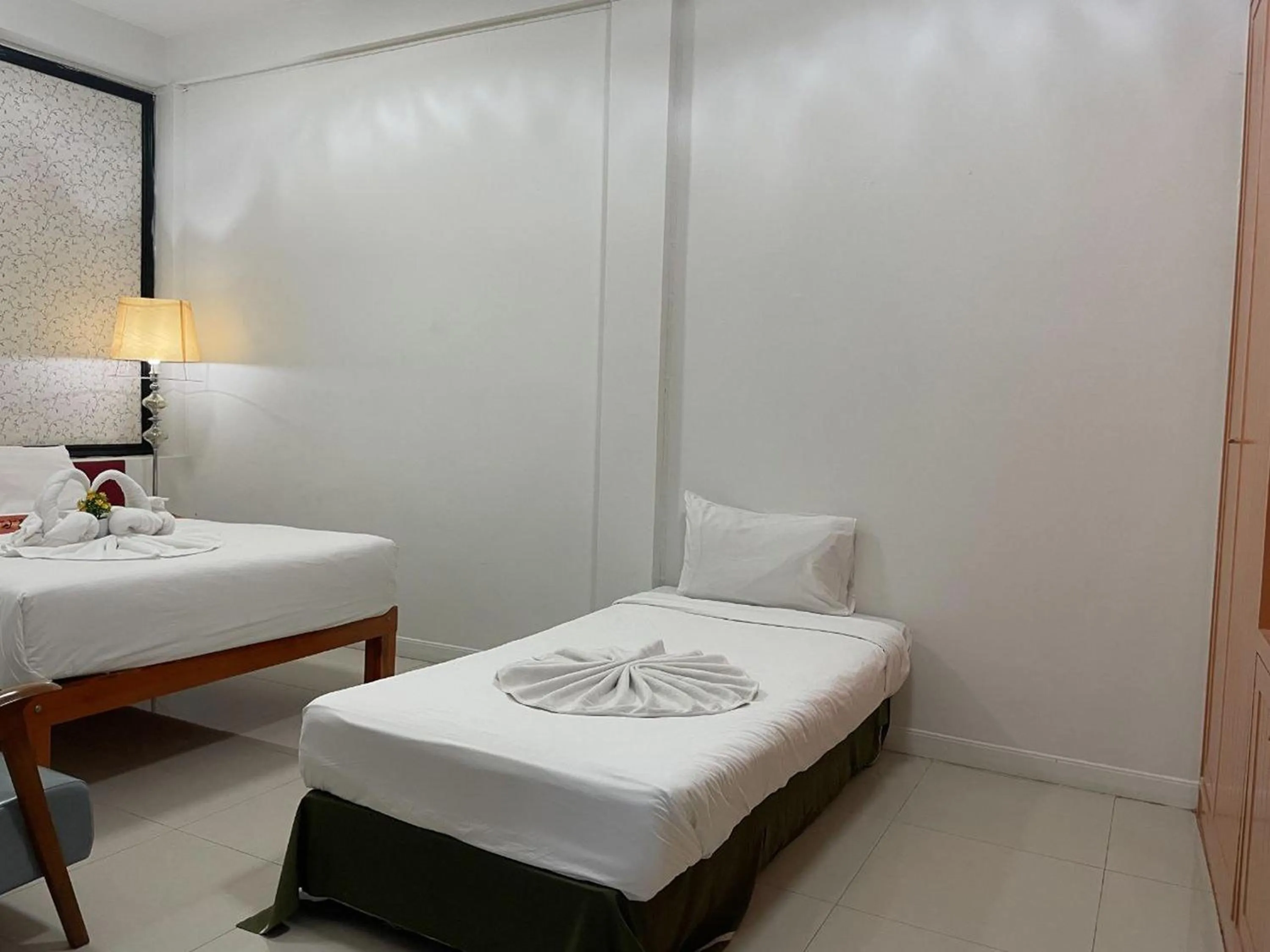 Bed in Happy 2 Hotel Patunam