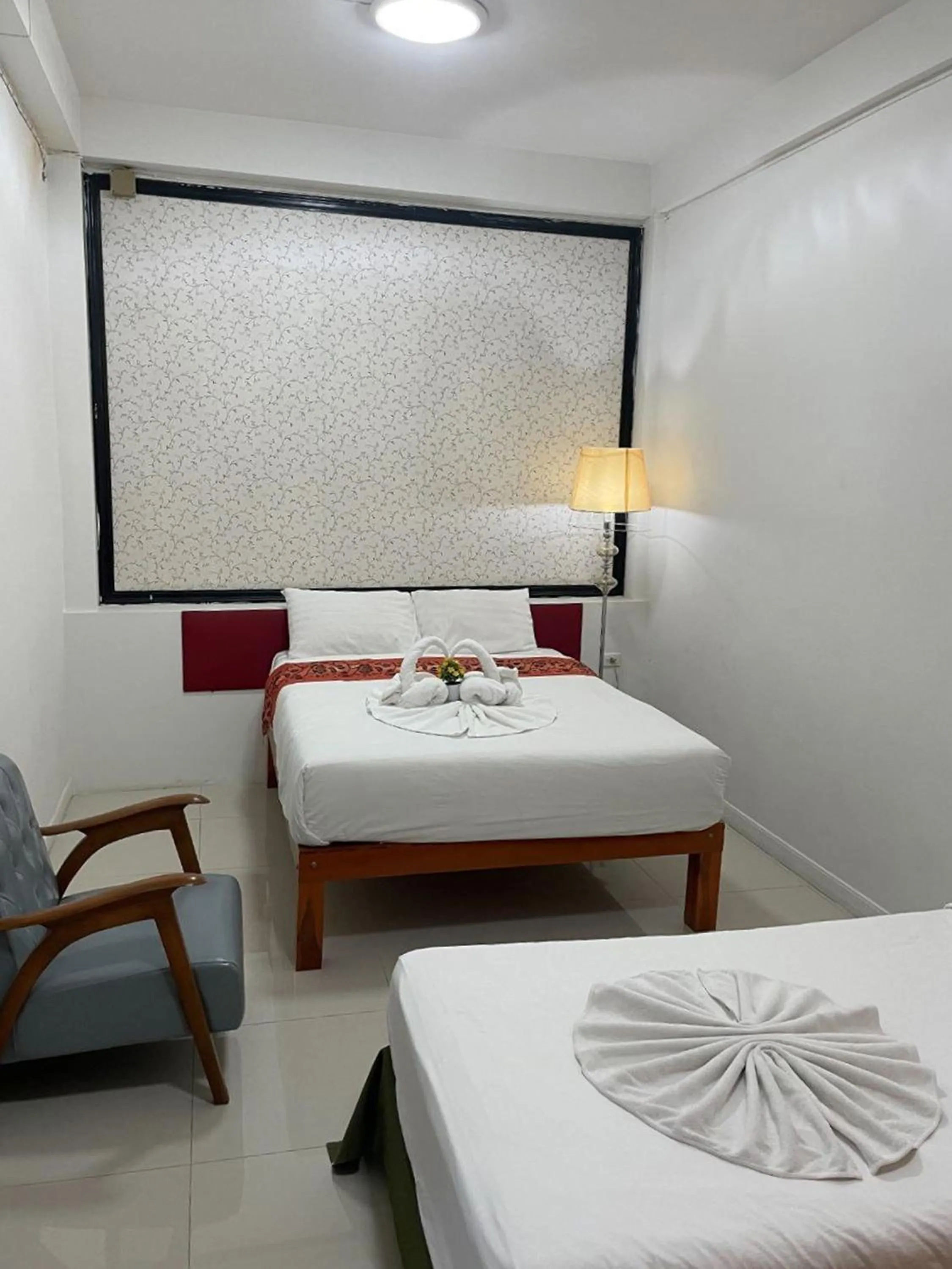 Bed in Happy 2 Hotel Patunam