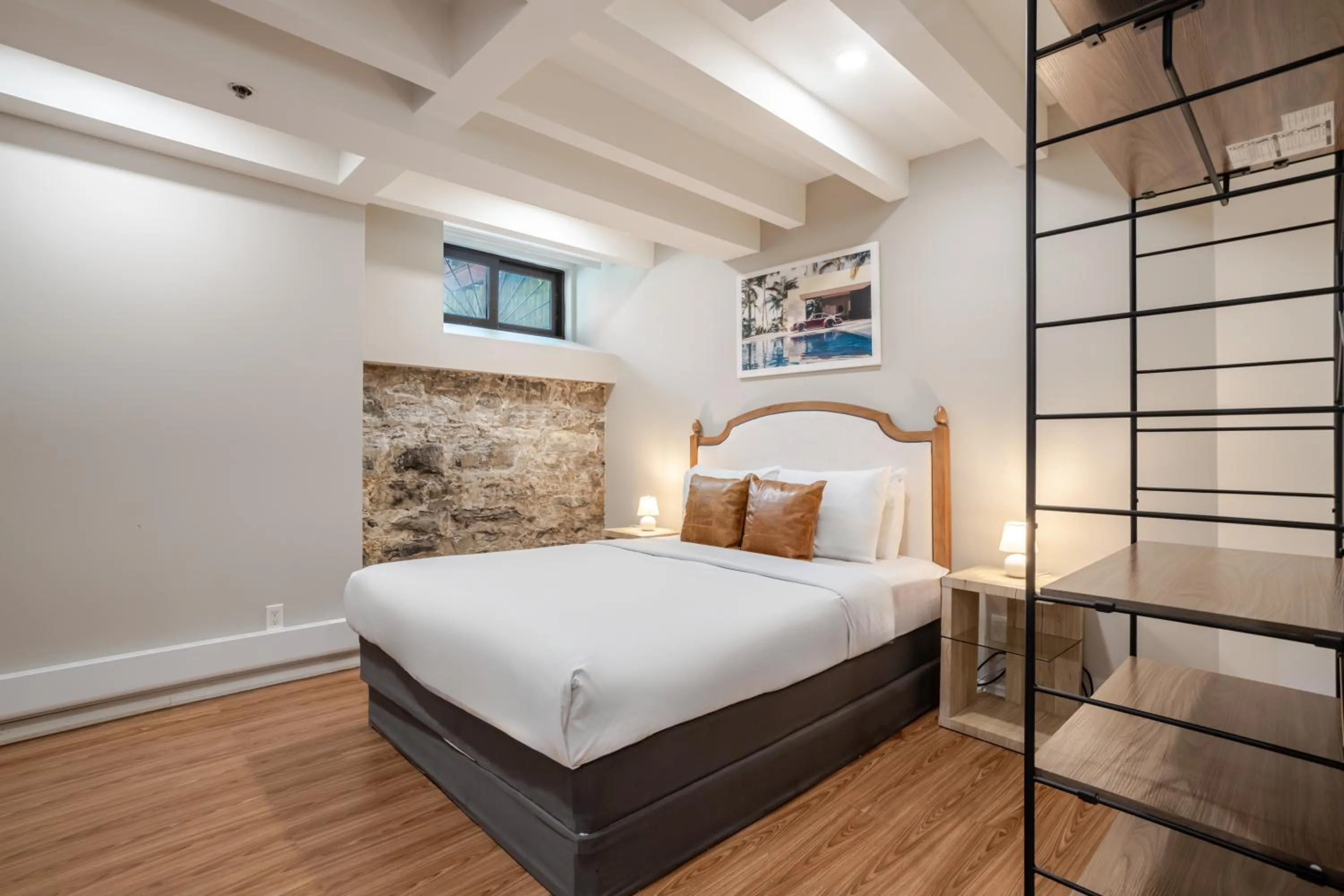 Bed in Olympia Hotel by Lodgo