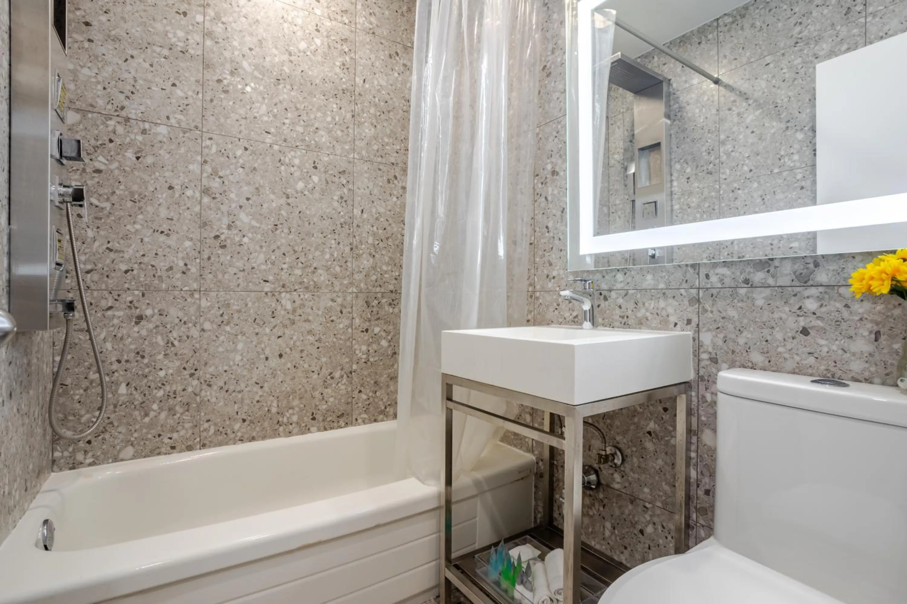 Shower in Olympia Hotel by Lodgo