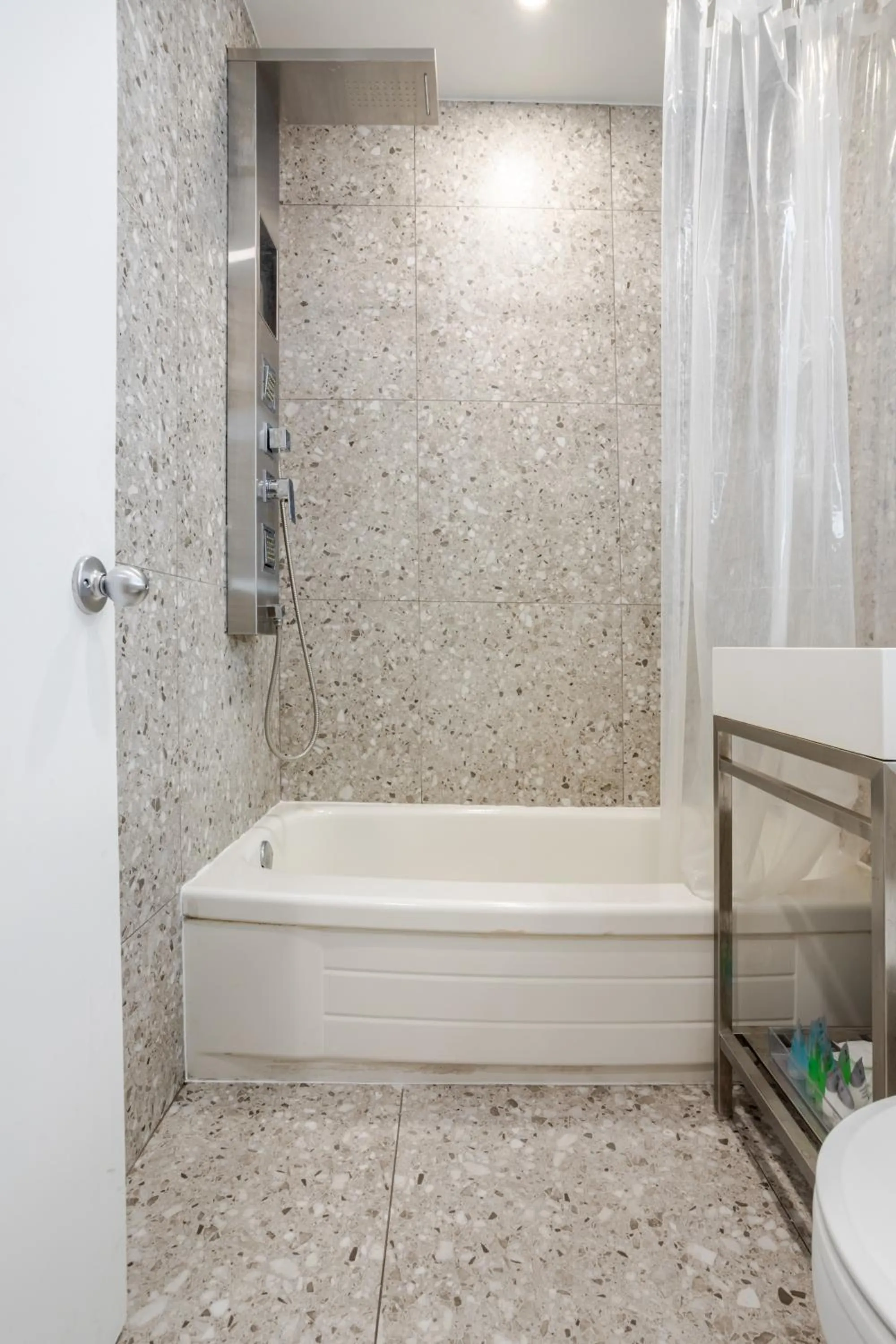 Shower in Olympia Hotel by Lodgo