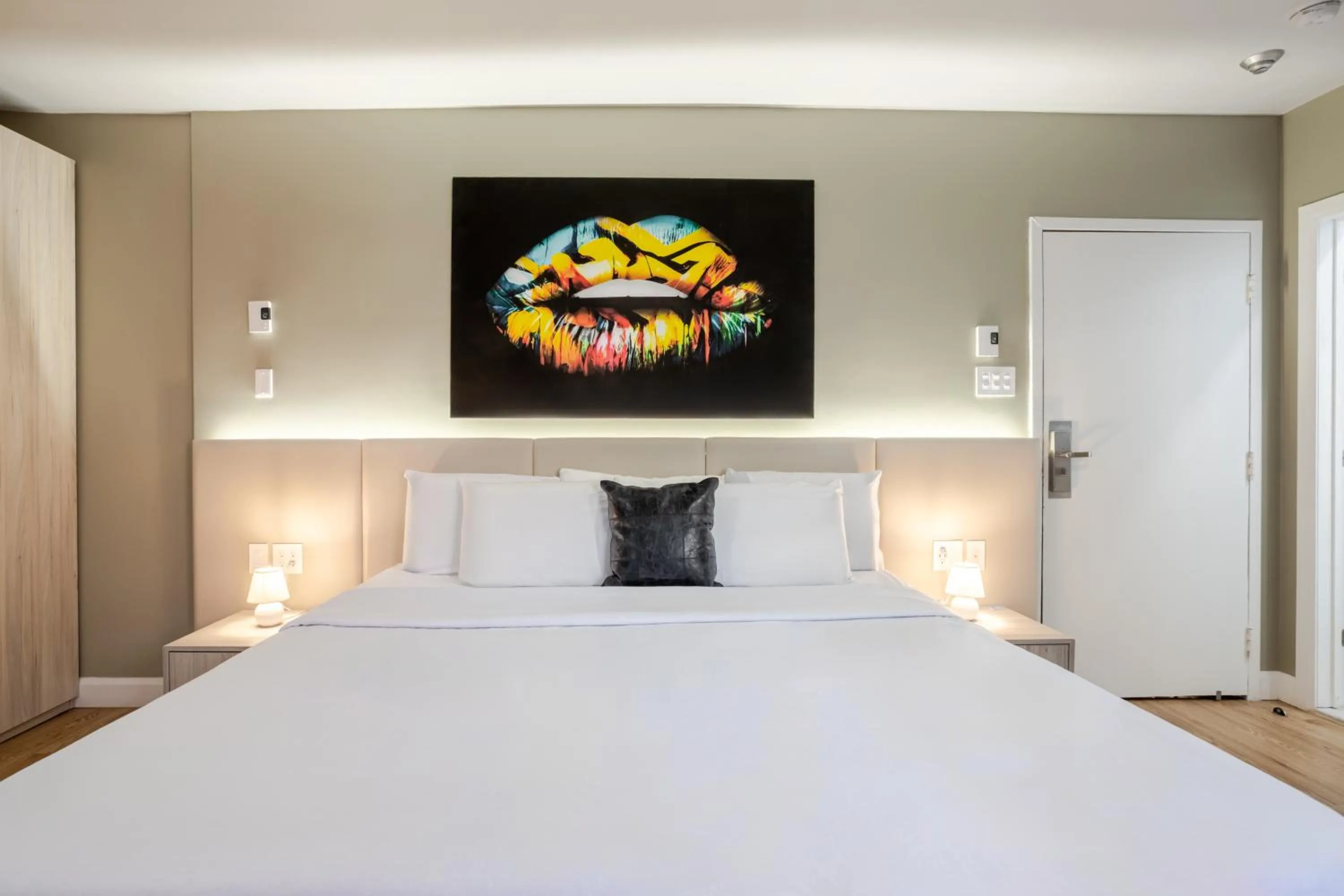 Bed in Olympia Hotel by Lodgo