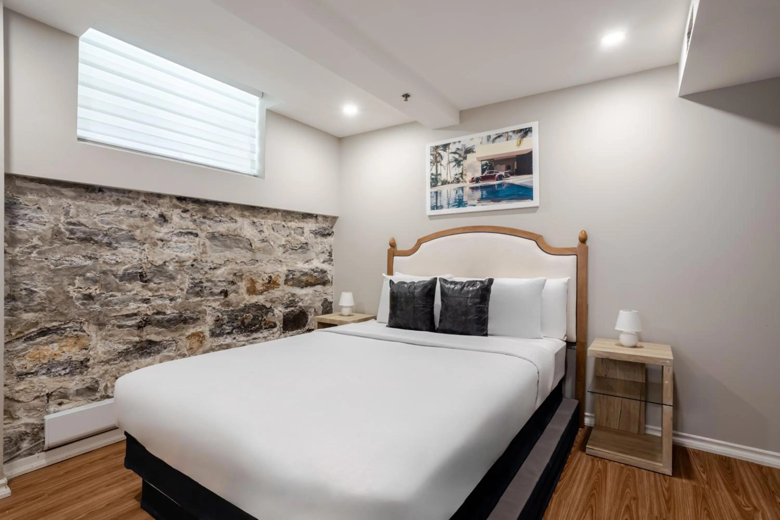 Bed in Olympia Hotel by Lodgo