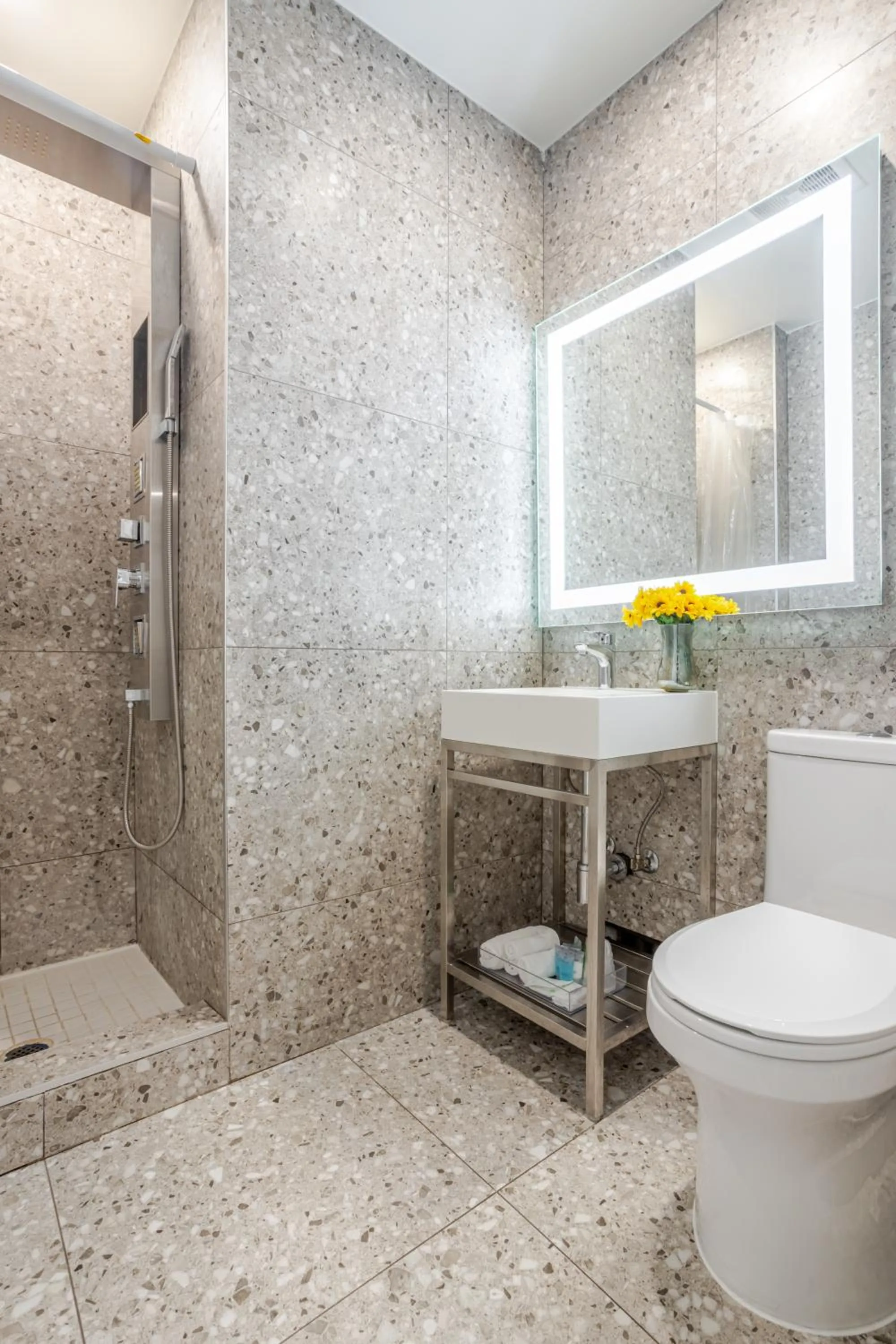 Shower in Olympia Hotel by Lodgo