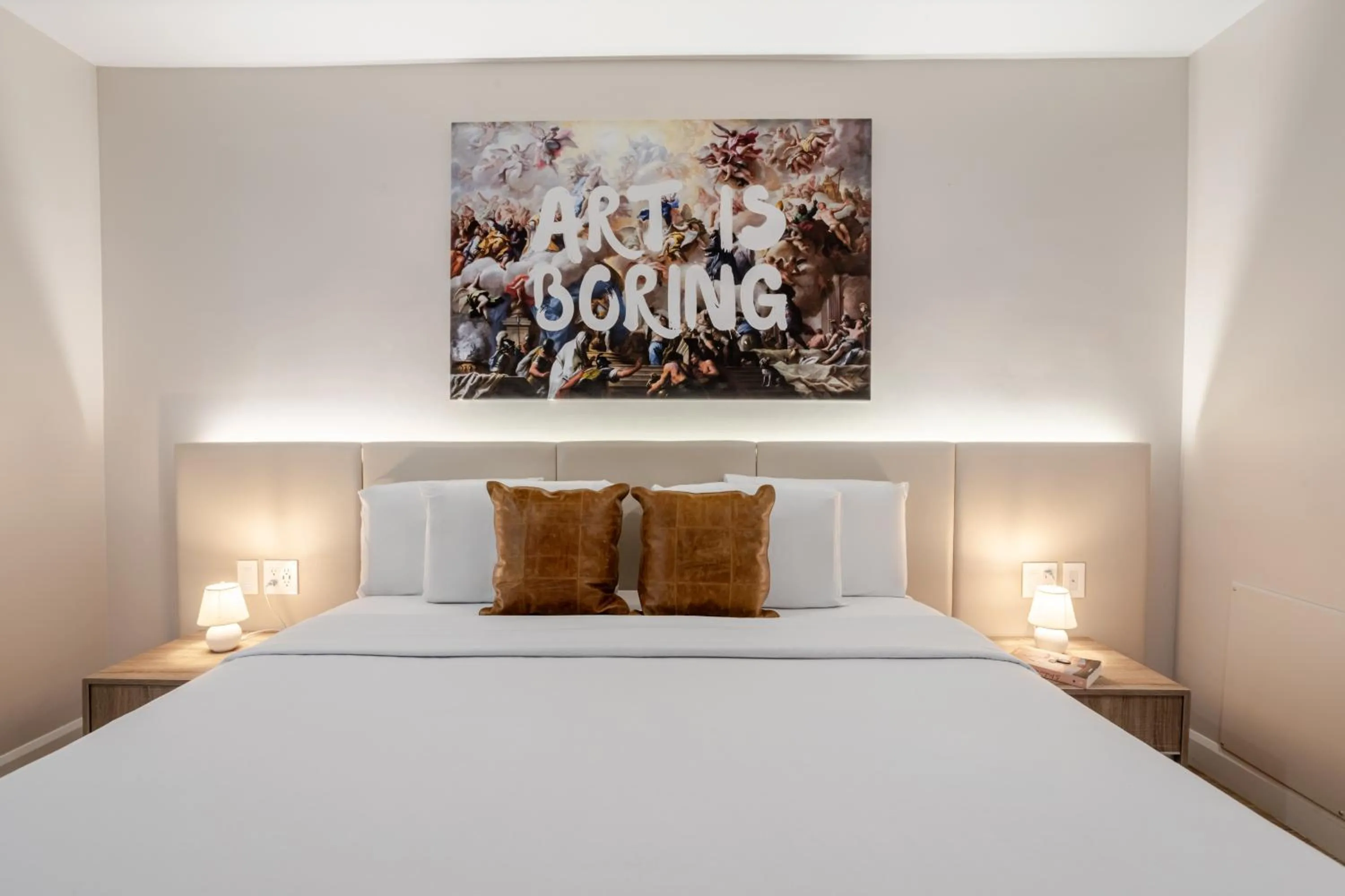 Bed in Olympia Hotel by Lodgo