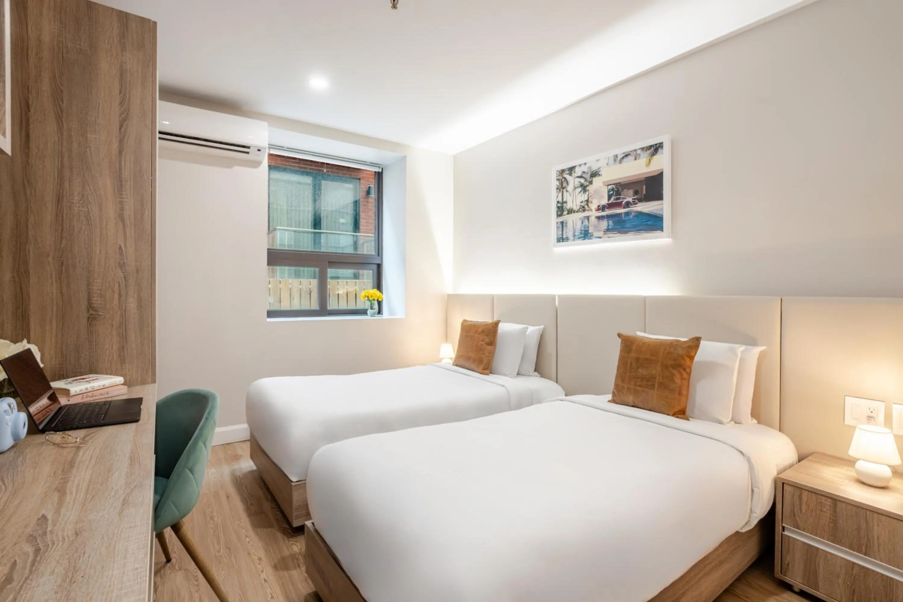 Bed in Olympia Hotel by Lodgo