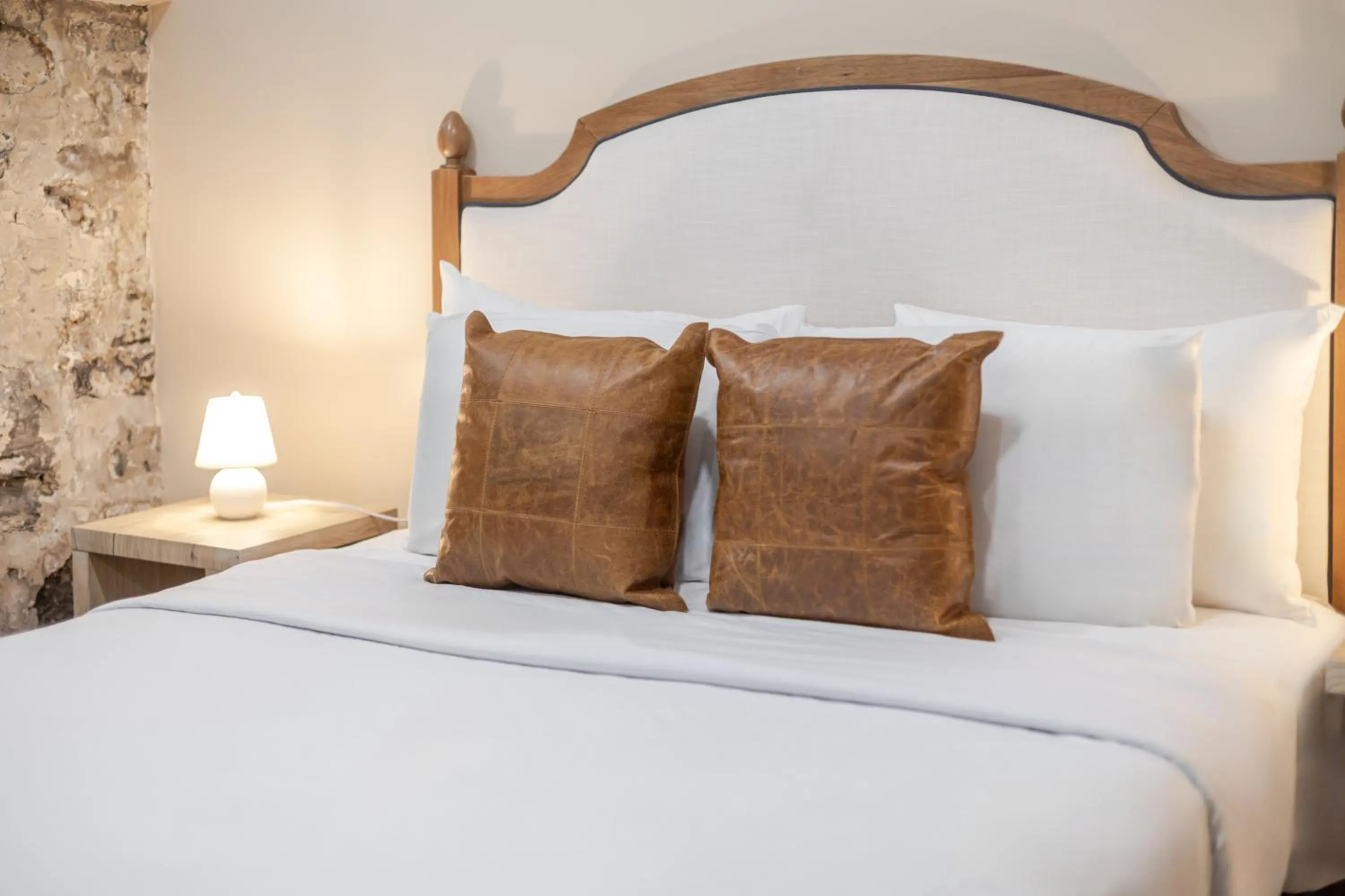 Bed in Olympia Hotel by Lodgo