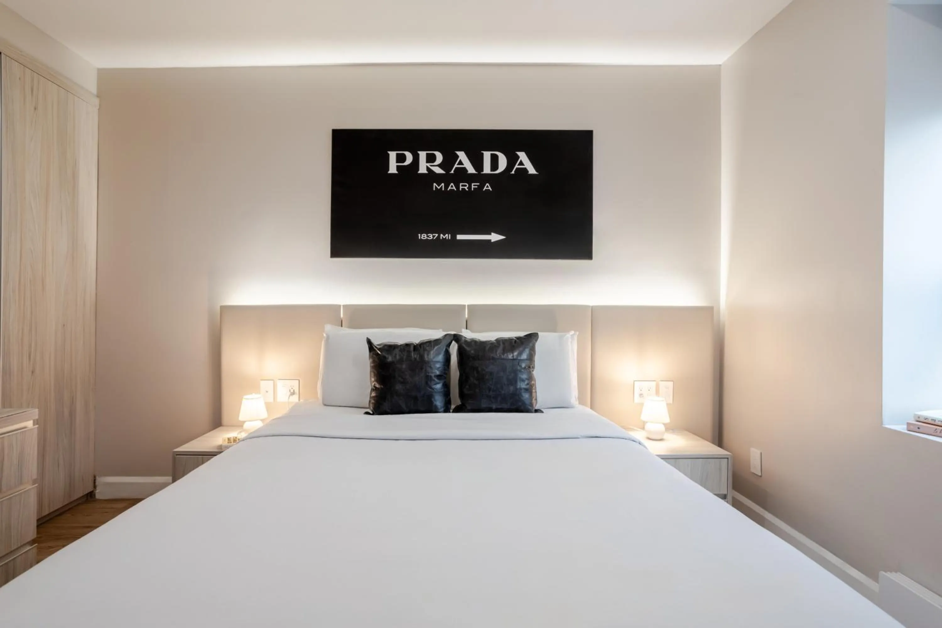 Bed in Olympia Hotel by Lodgo