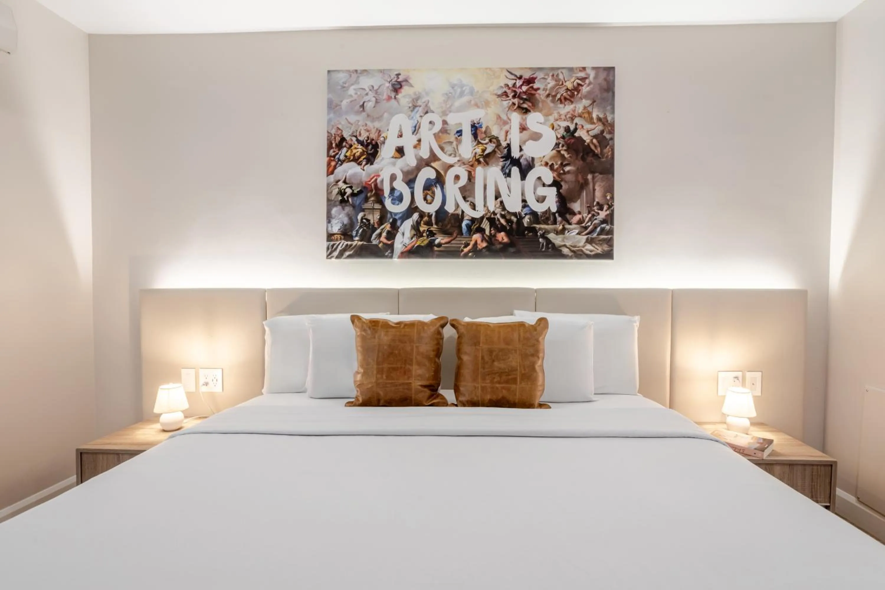 Bed in Olympia Hotel by Lodgo