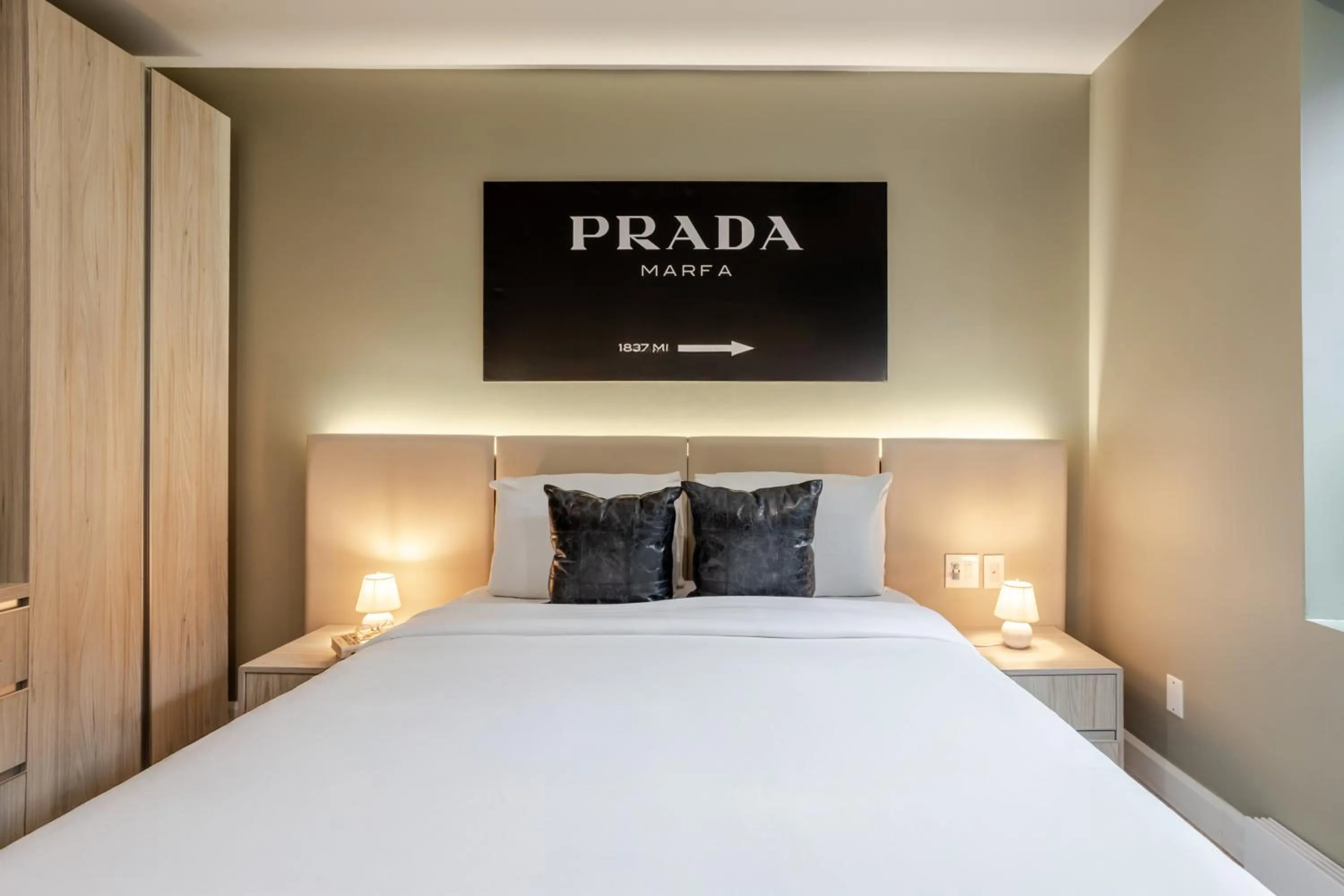 Bed in Olympia Hotel by Lodgo