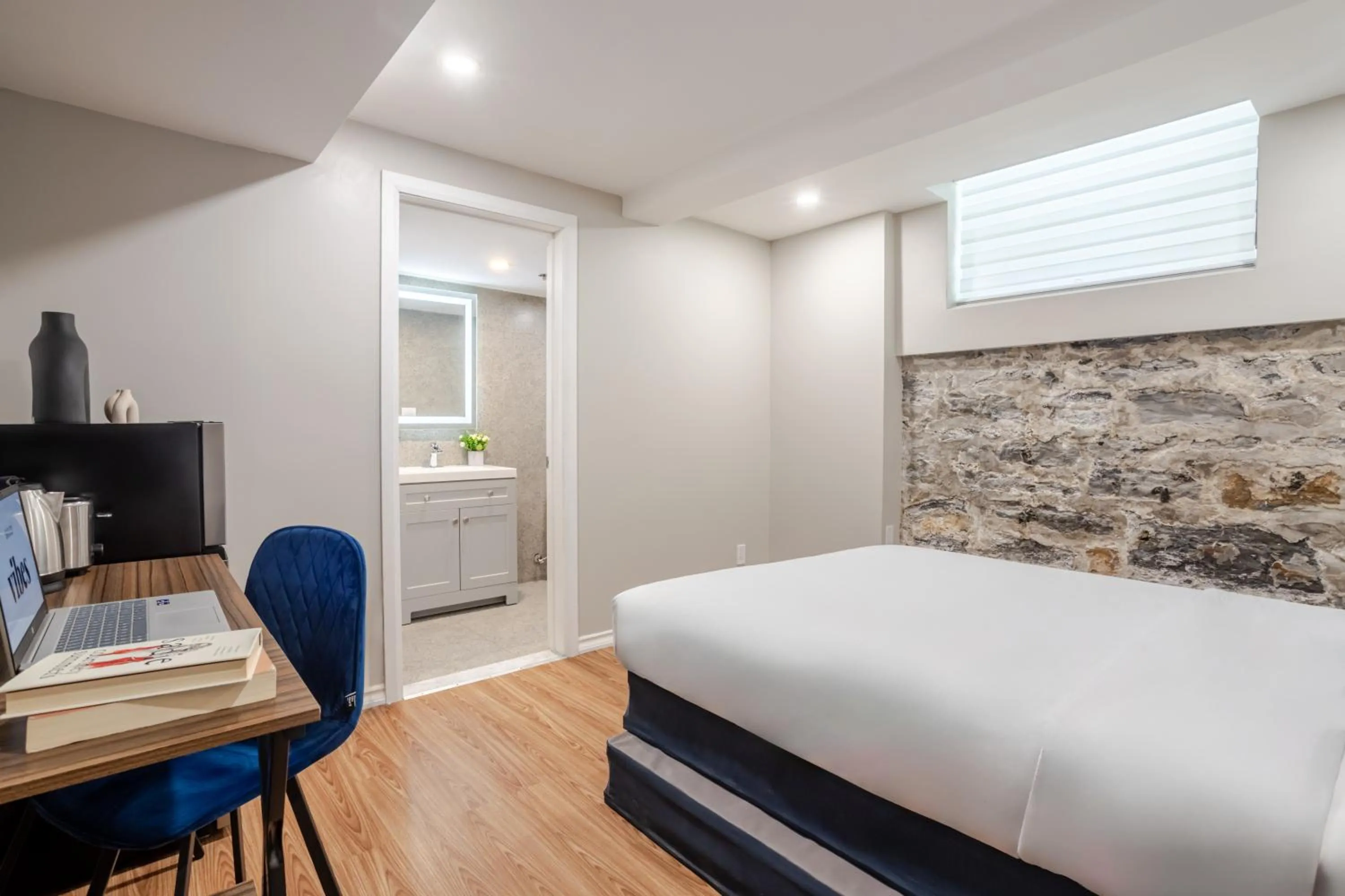 Bed in Olympia Hotel by Lodgo