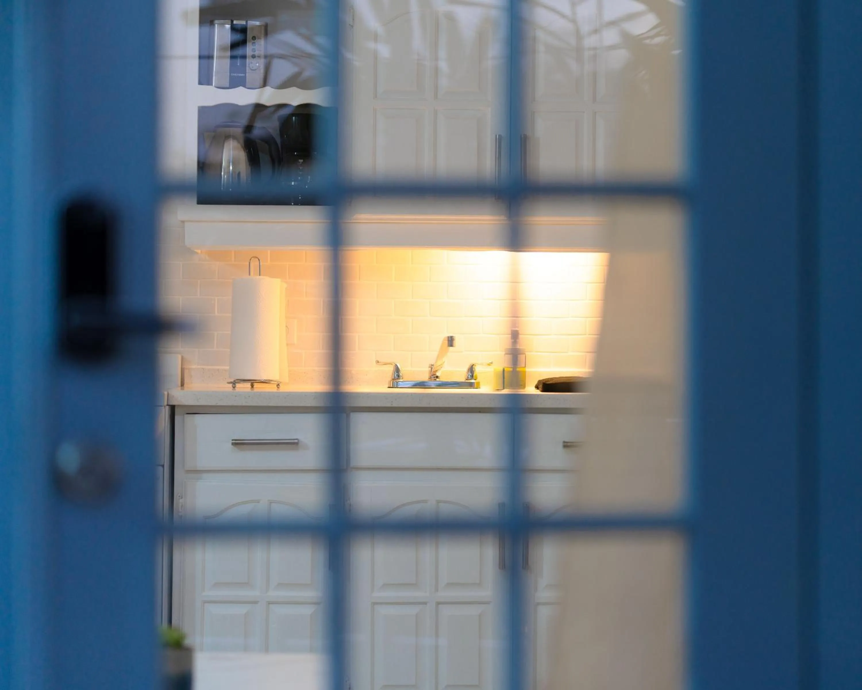 Kitchen or kitchenette in Sunset Lane Apartment Hotel