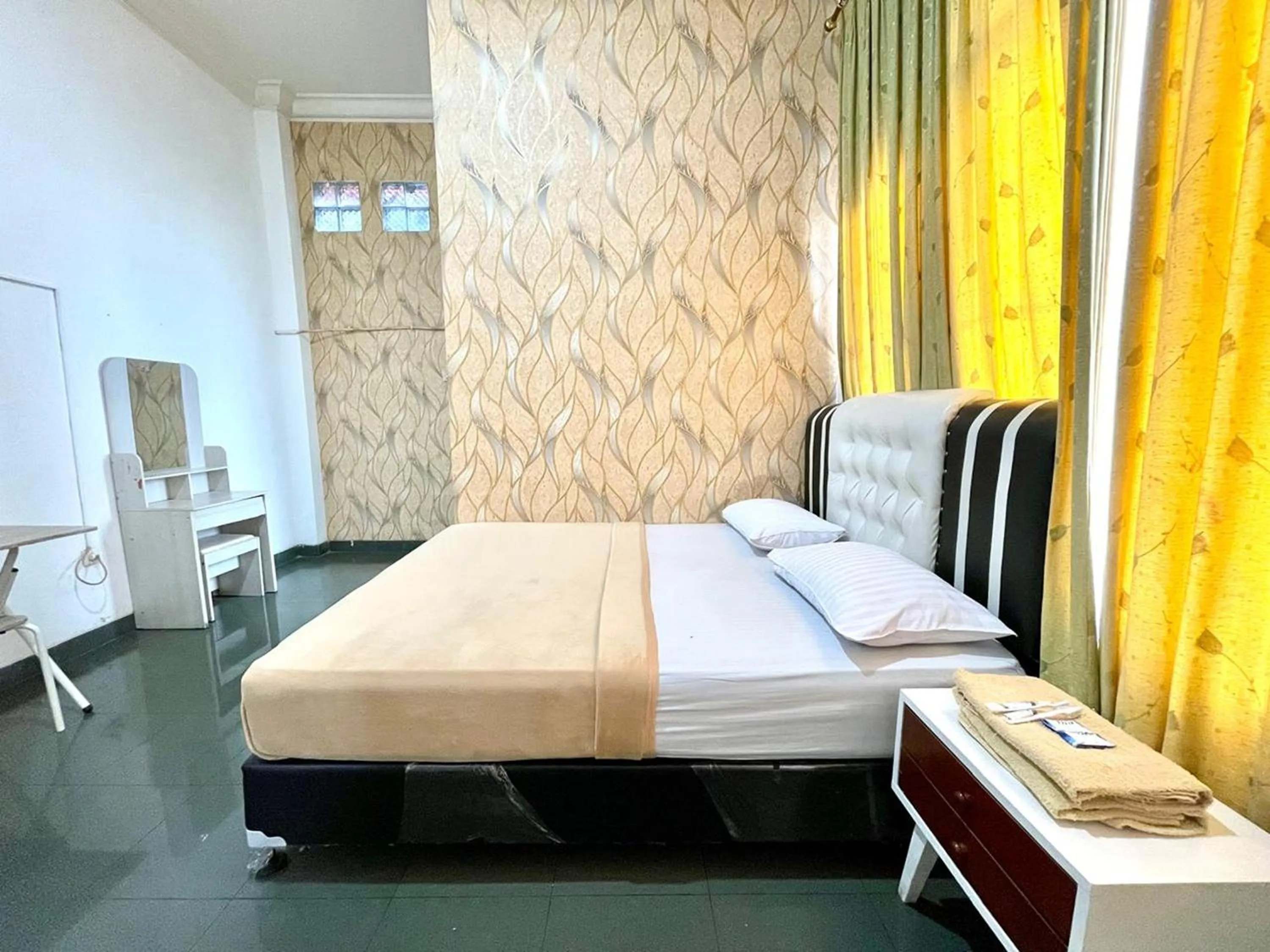 Bed in Yani Guesthouse