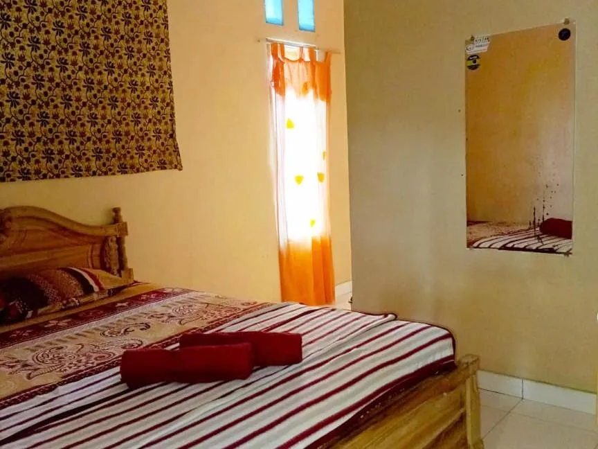 Bed in Lishafa Homestay