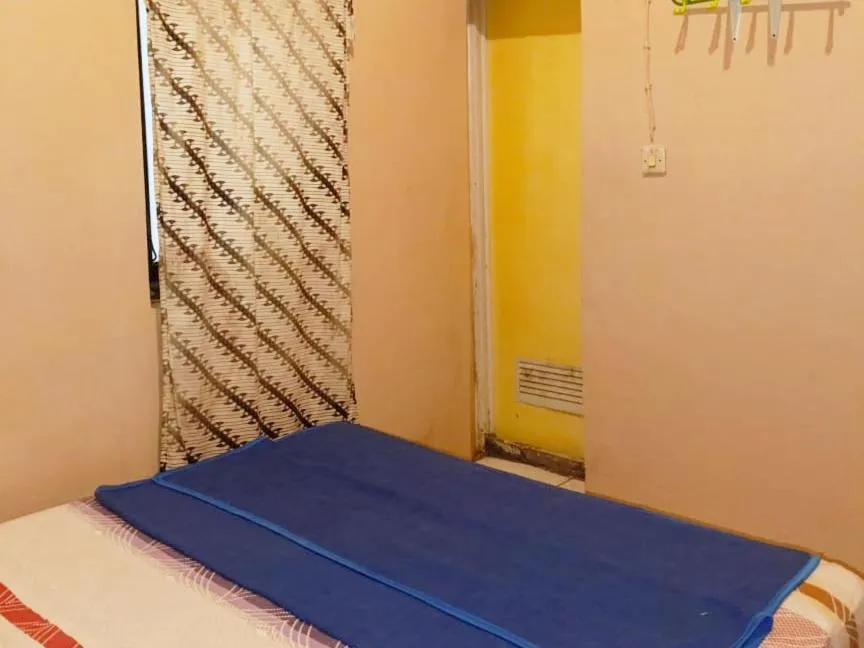 Bed in Lishafa Homestay