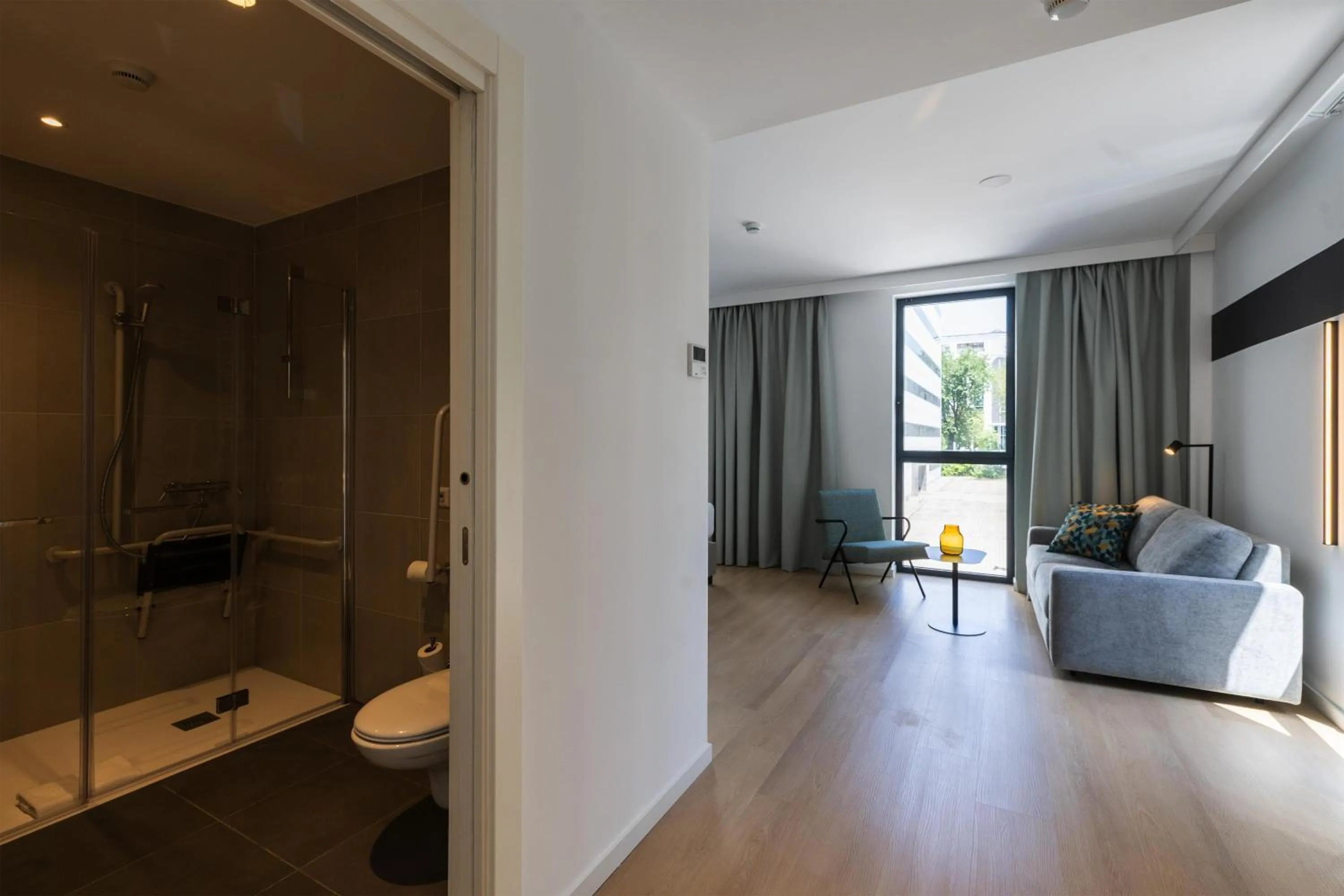 Living room in Spark By Hilton Madrid Alcala