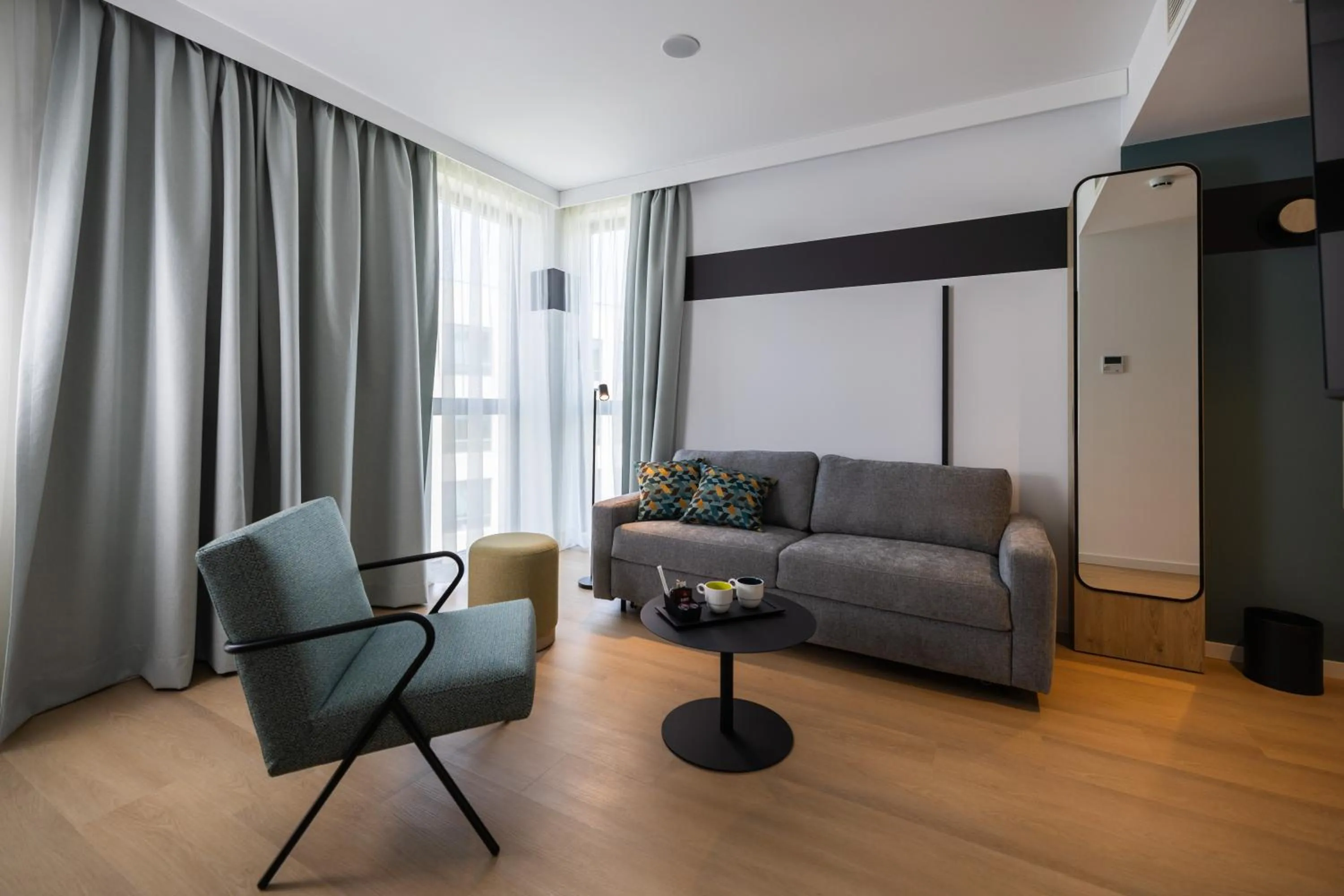 Living room in Spark By Hilton Madrid Alcala