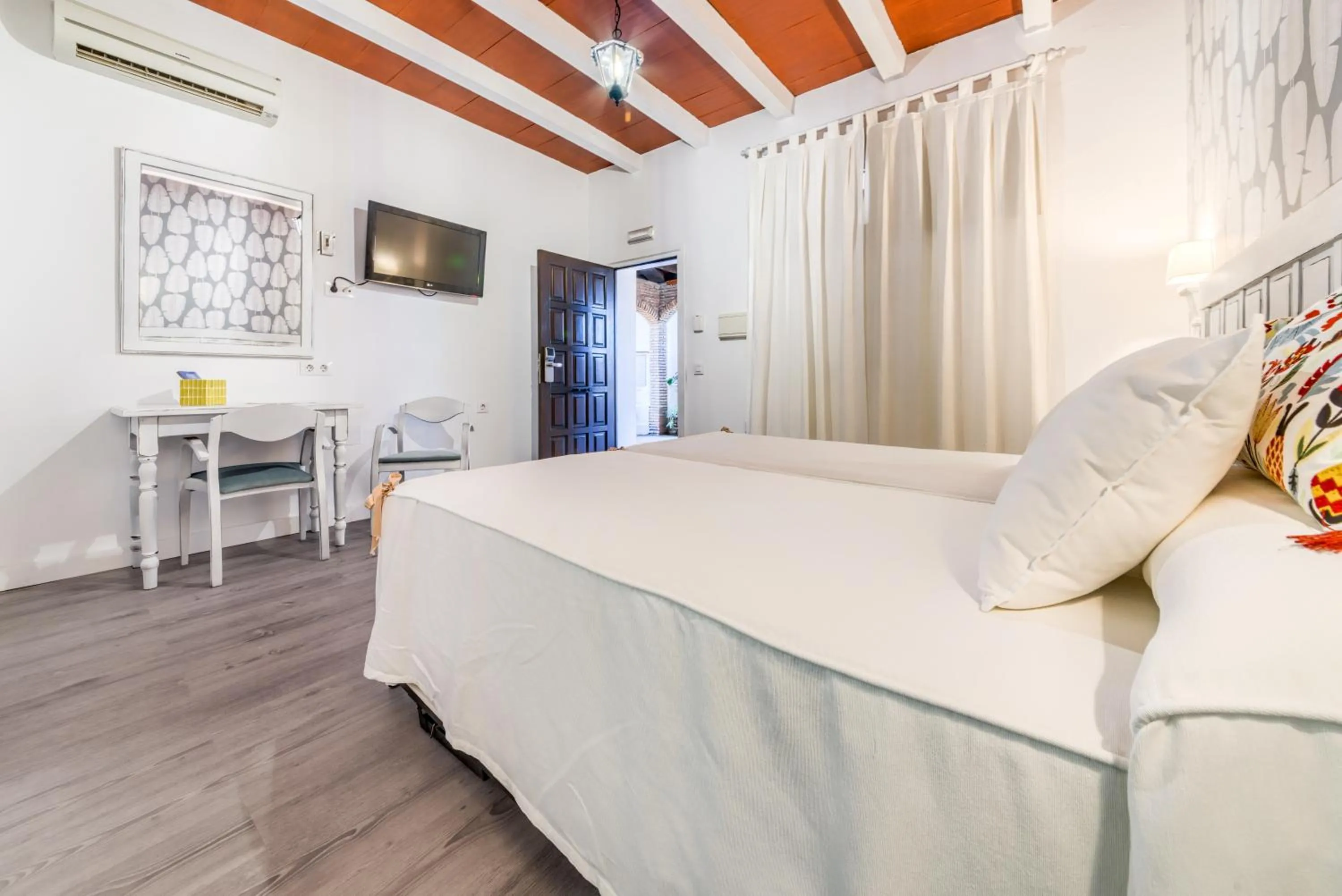 Bed in Dulce Nombre Hotel - Apartamentos