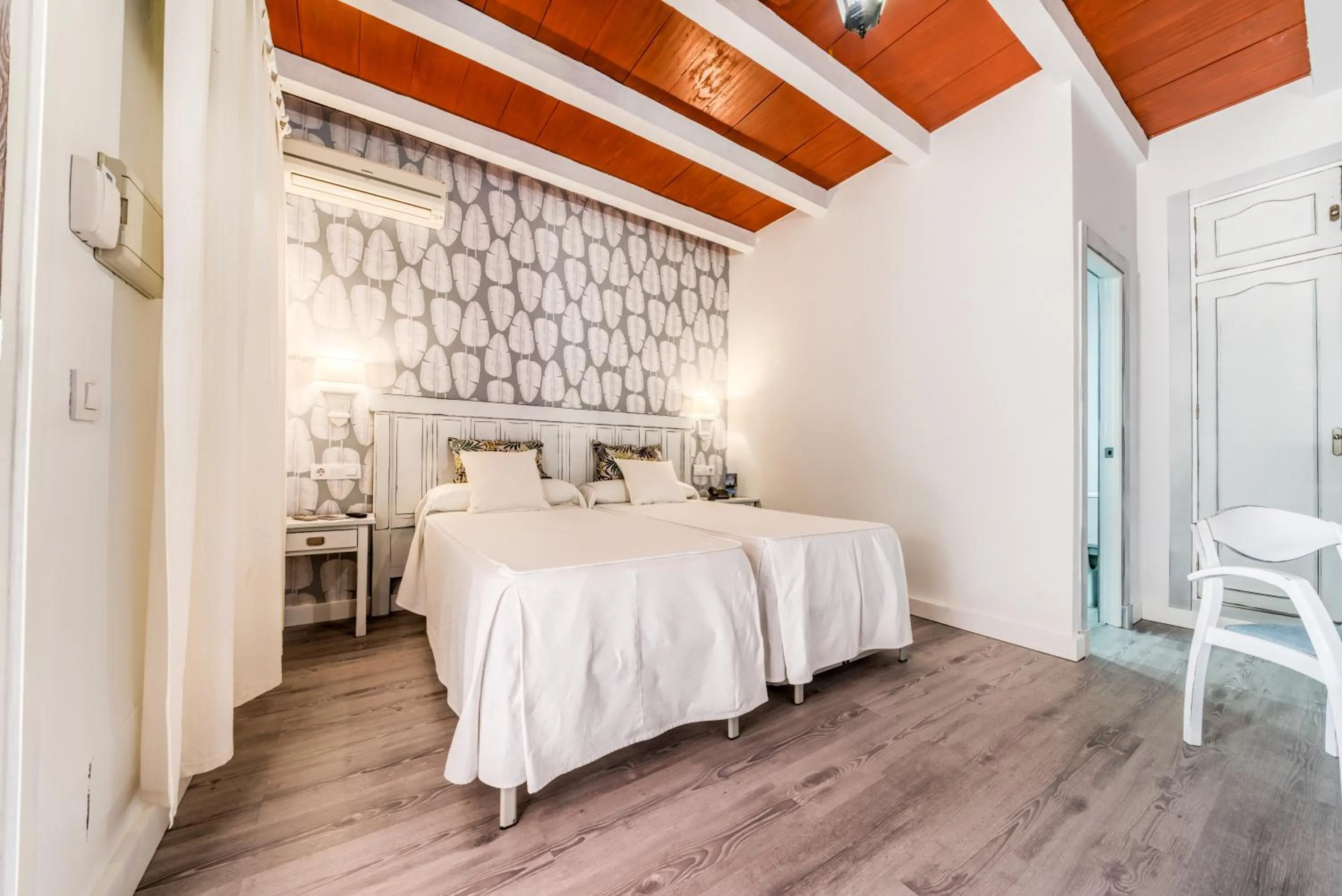 Bed in Dulce Nombre Hotel - Apartamentos