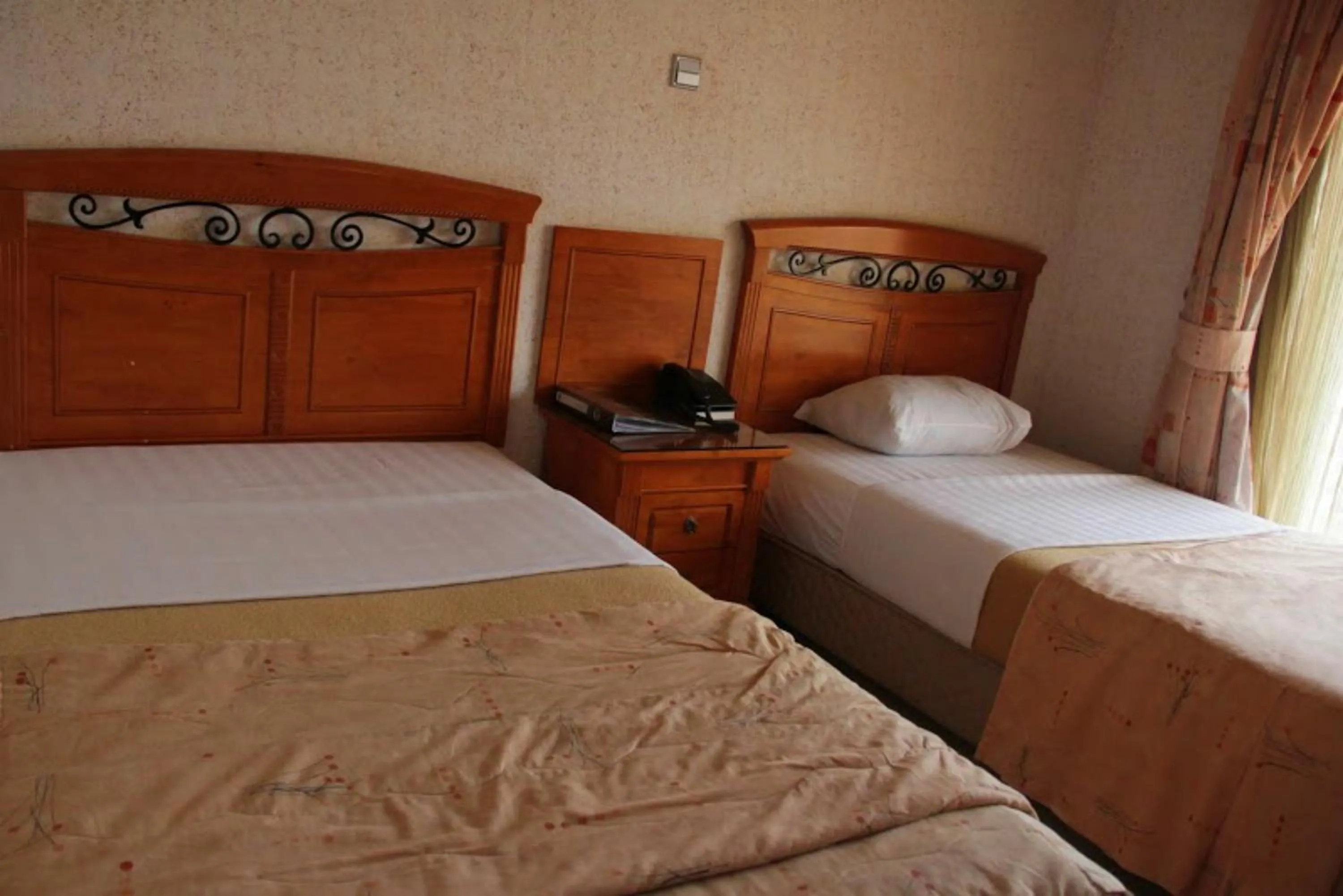 Bed in Landmark View Hotel