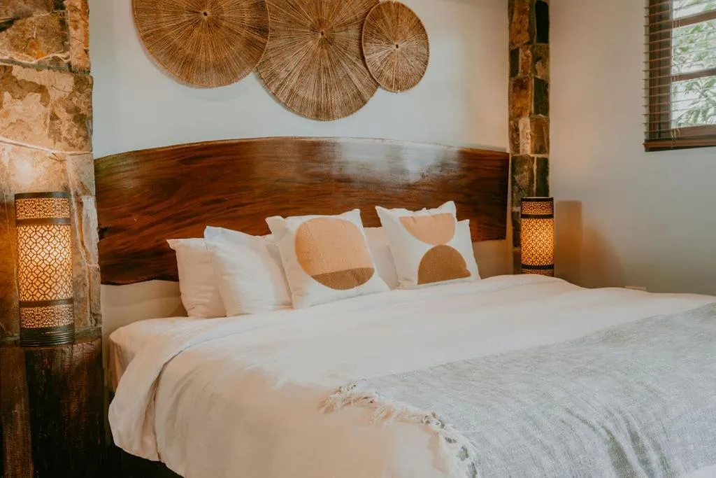 Bed in Sansara Surf Yoga & Resort