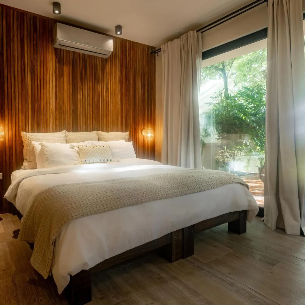 Bed in Sansara Surf Yoga & Resort