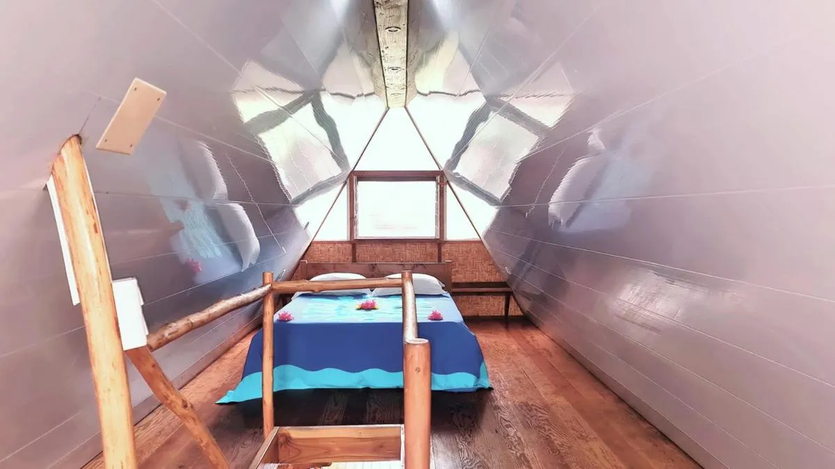 Bed in Pension Les Trois Cascades