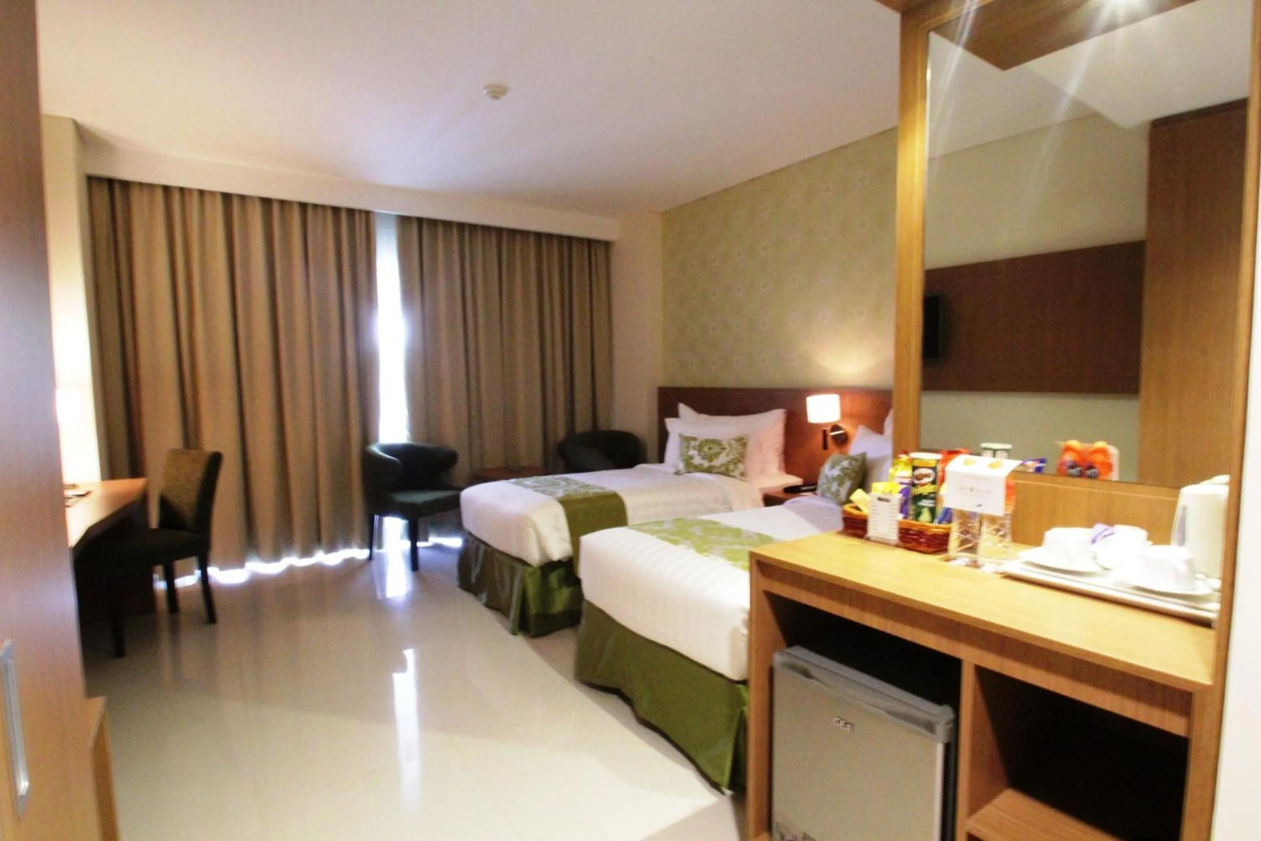 Bed in Ijen Suites Resort & Convention
