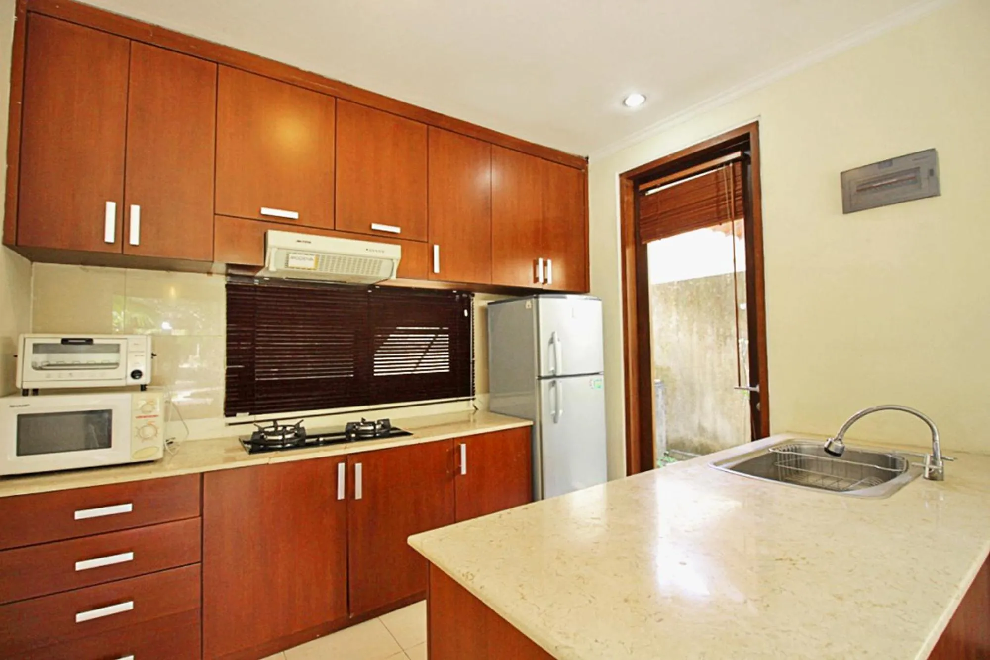 Kitchen or kitchenette in Sayang Taman Villas