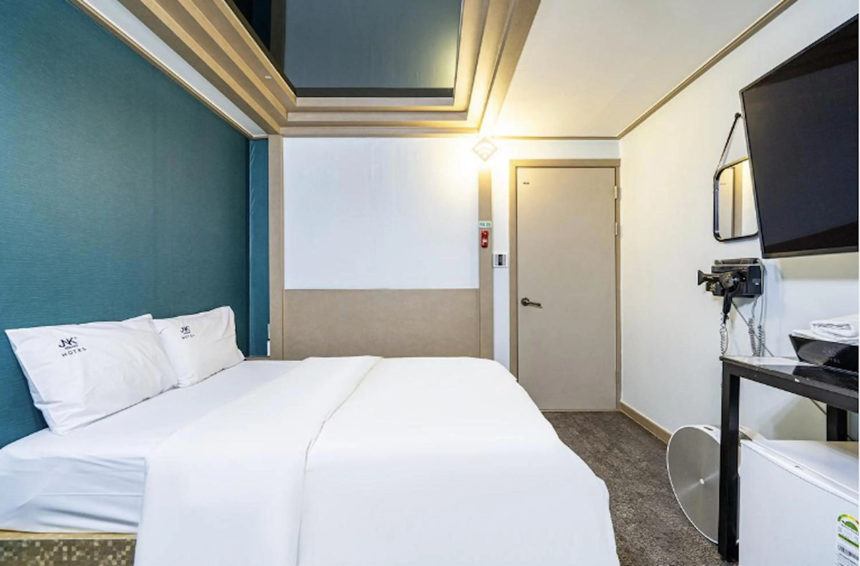 Bed in Daejeon Yongmun JNK Classic Hotel