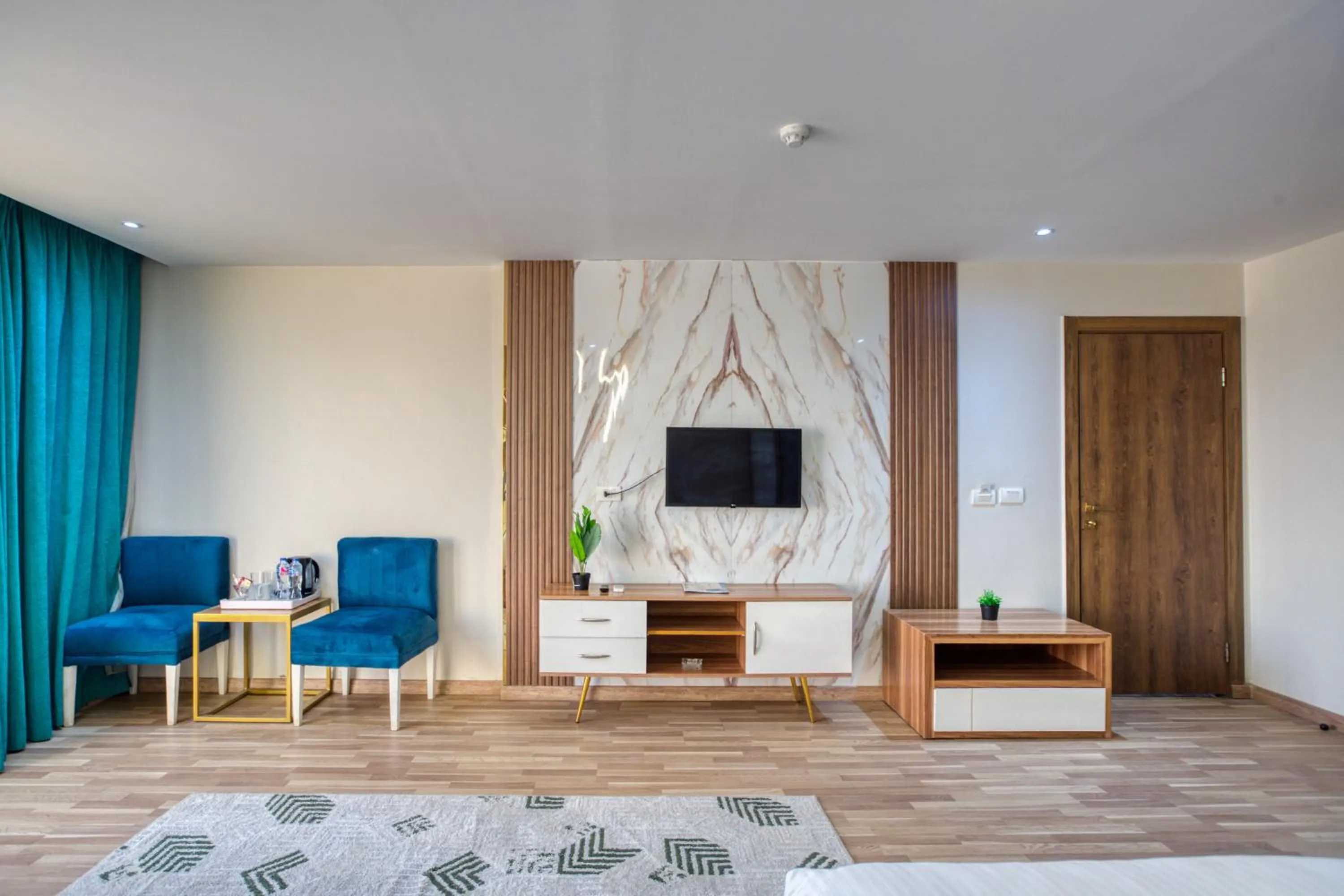 Seating area, Bed in Pyramids Yard Hotel