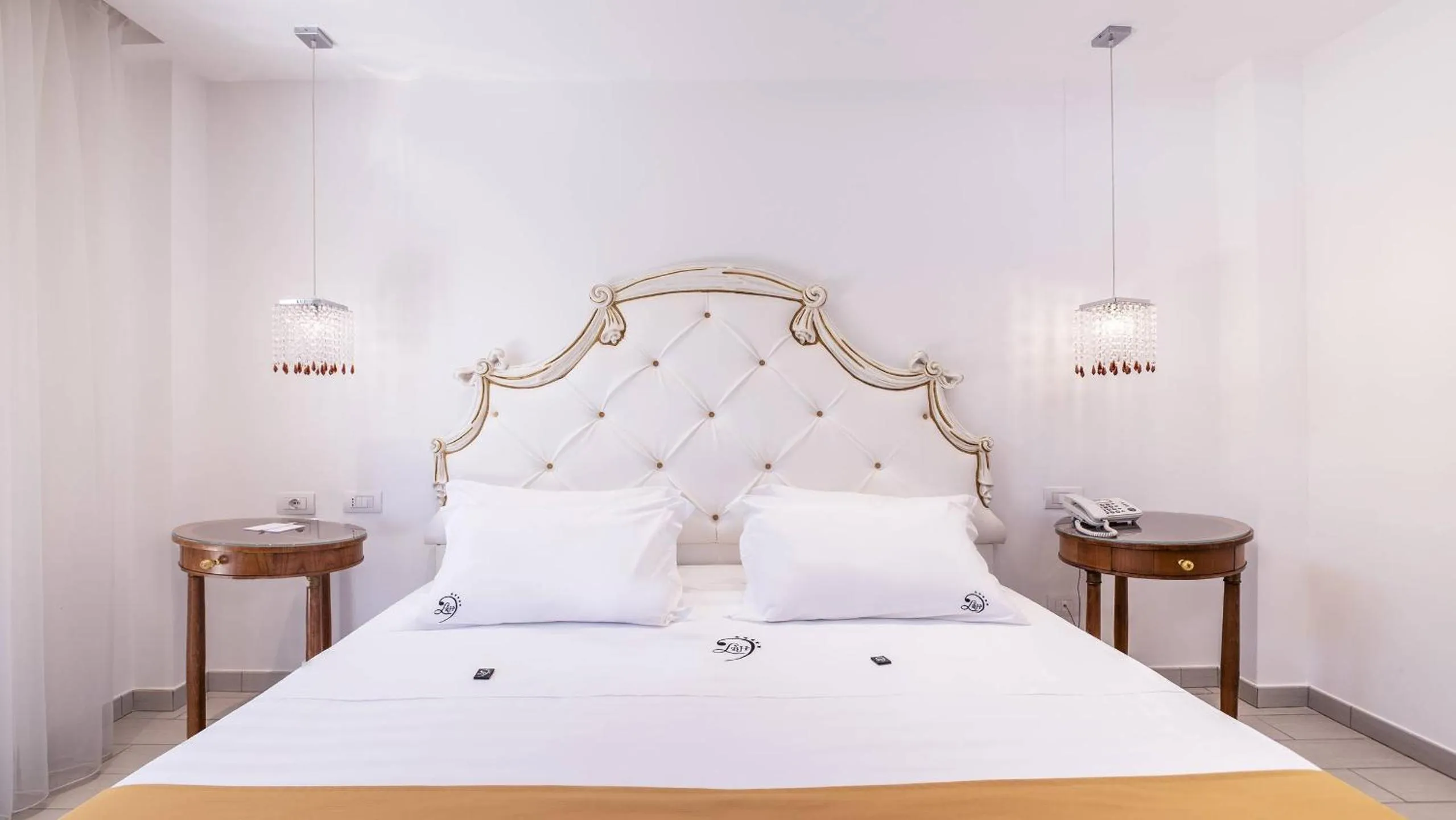 Bed in Ludwig Boutique Hotel & Spa