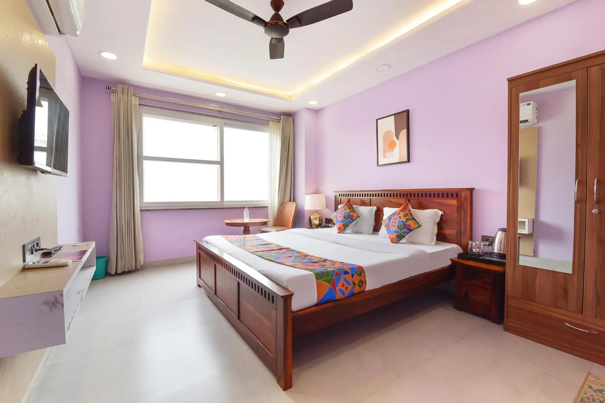 Bed in FabHotel Pink Palace Raja Park