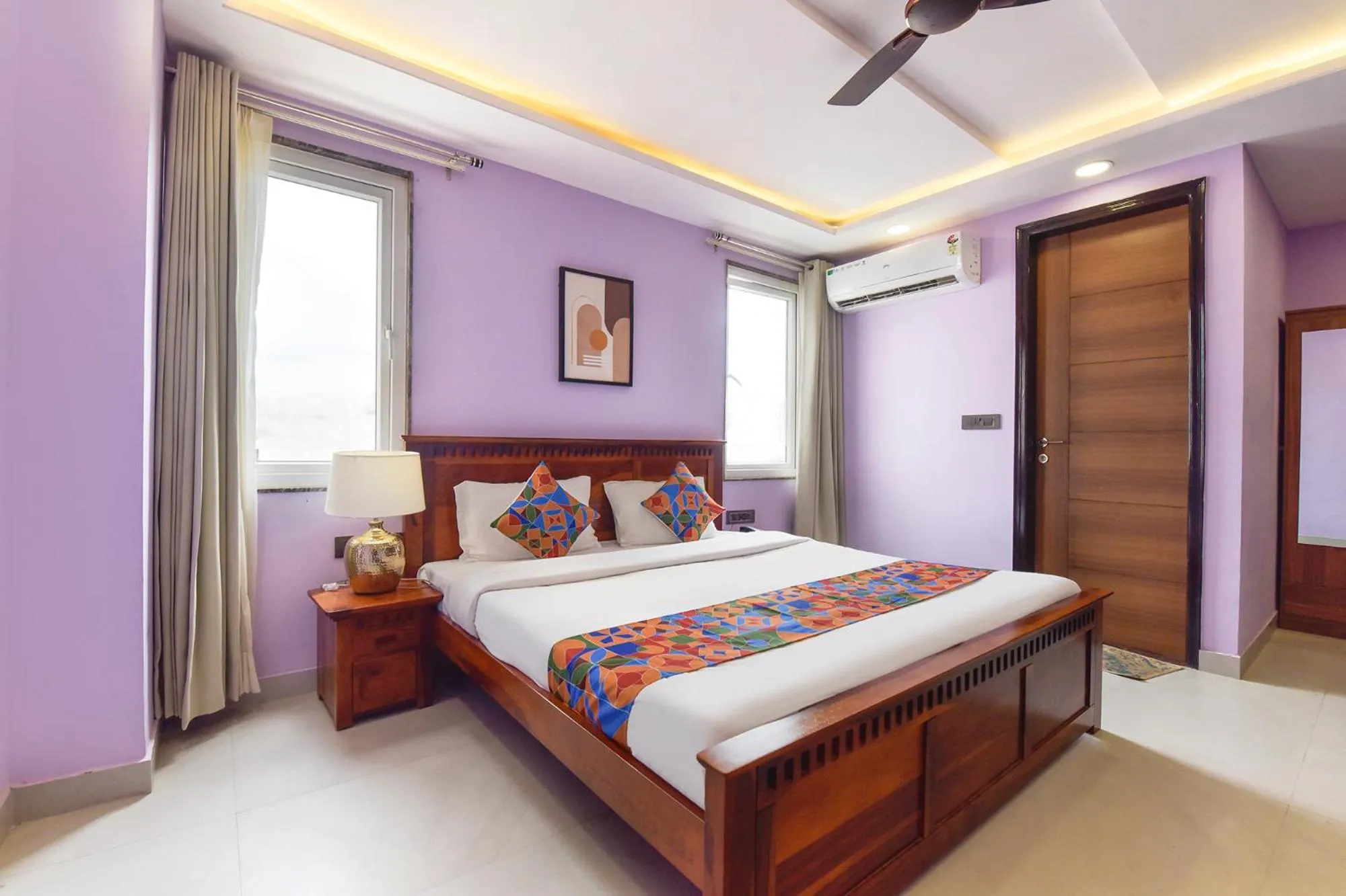 Bed in FabHotel Pink Palace Raja Park