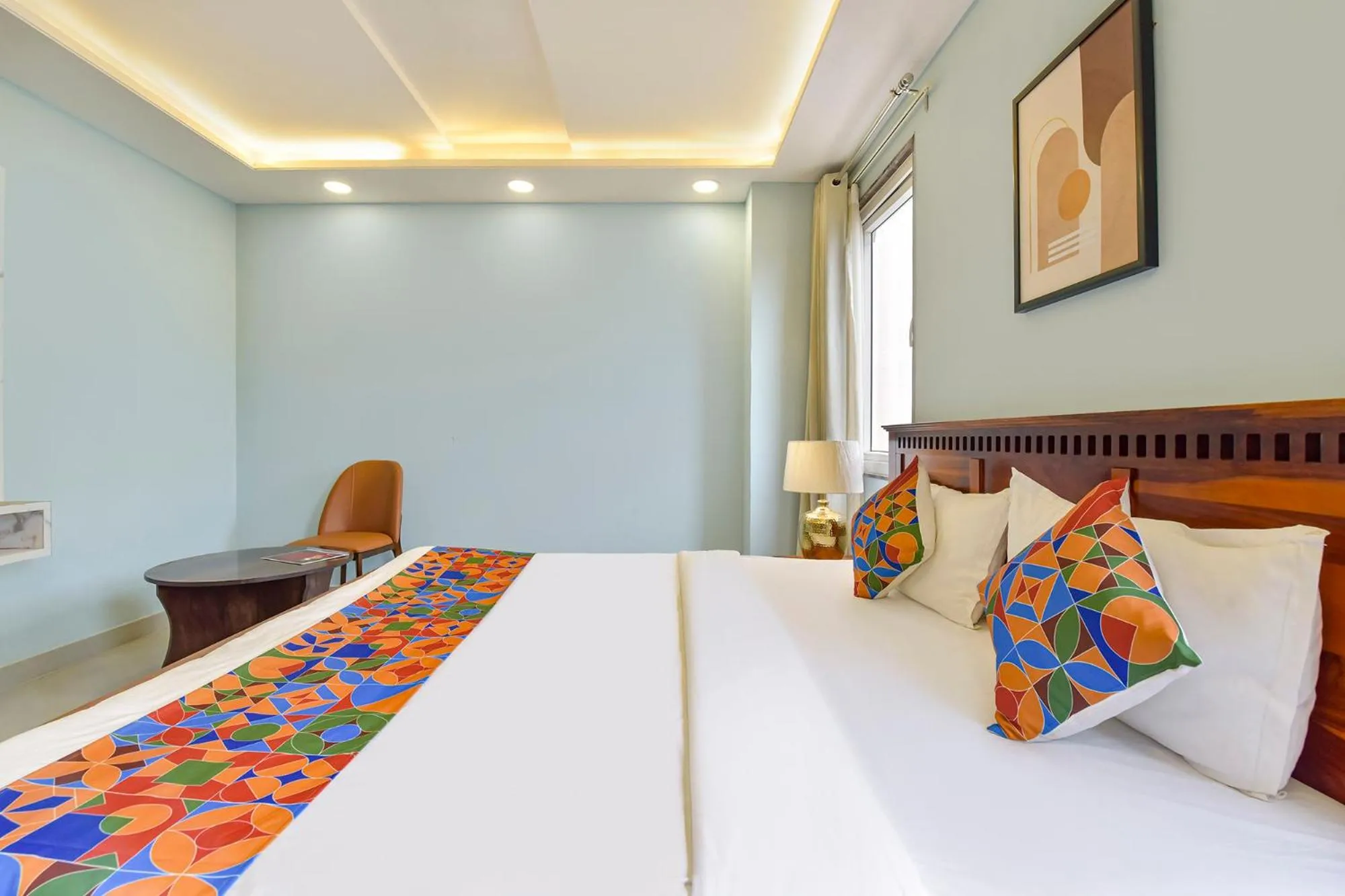 Bed in FabHotel Pink Palace Raja Park